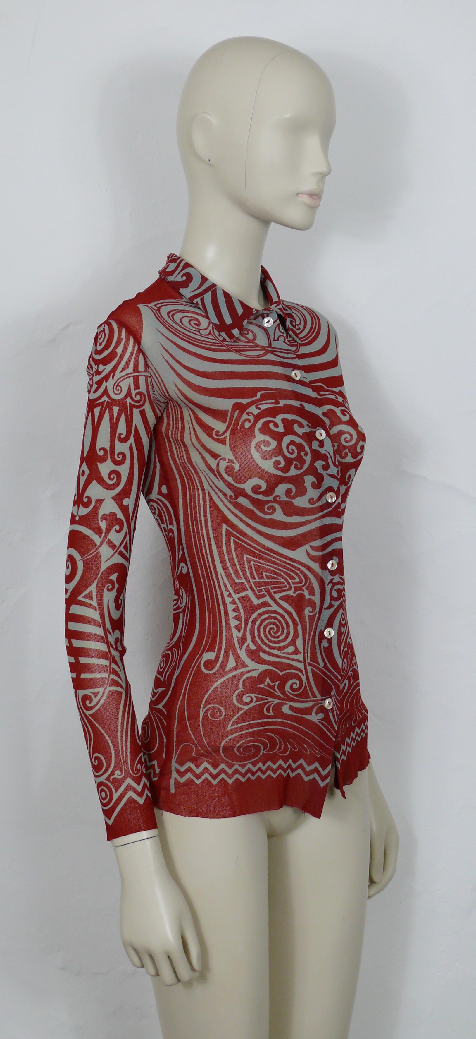 JEAN PAUL GAULTIER vintage 1996 FUZZI sheer mesh shirt featuring a red tribal tattoo print all-over.

Label reads JEAN PAUL GAULTIER MAILLE.
Made in Italy.

Missing size label.
Please refer to measurements.

Missing composition tag (supposed 100%
