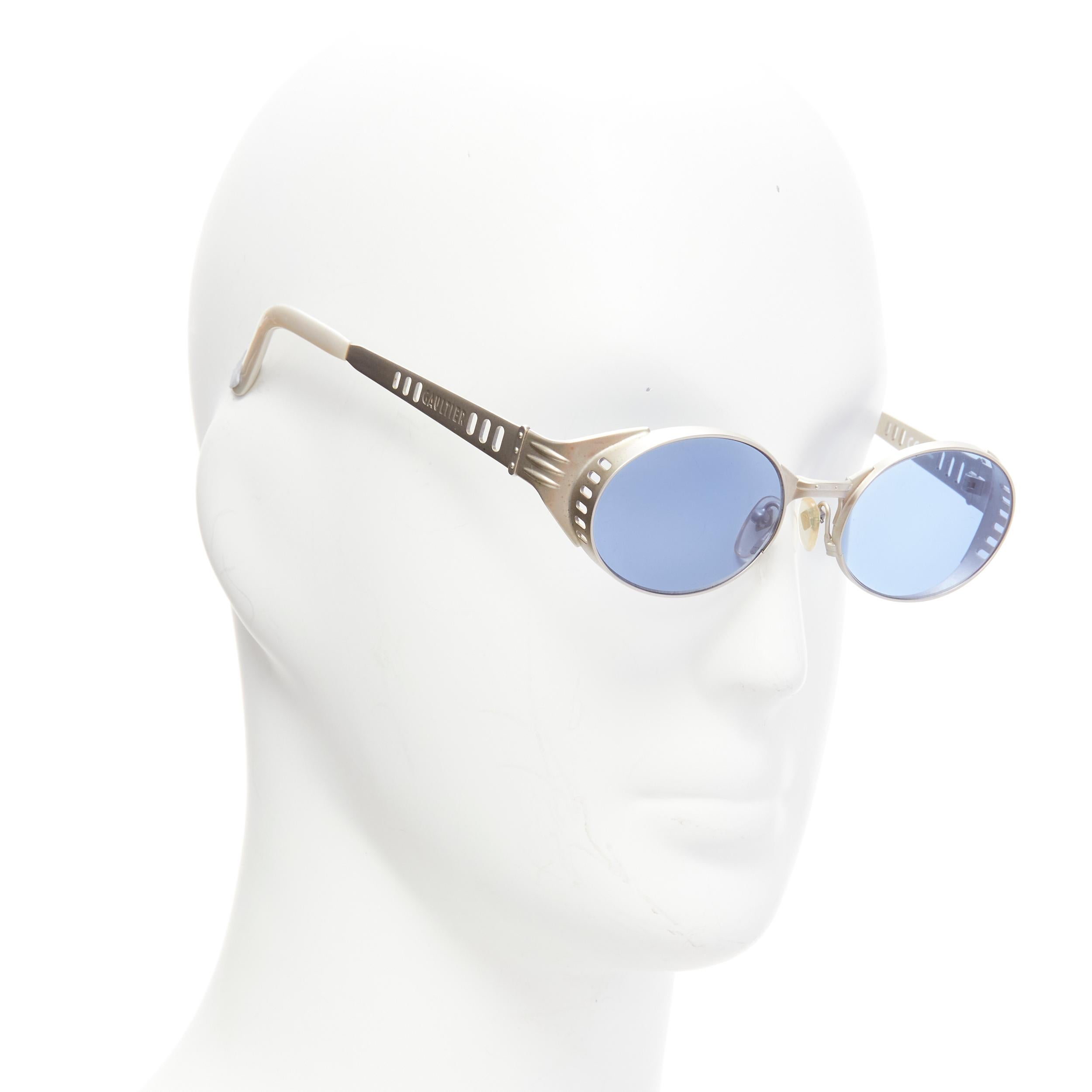 rare JEAN PAUL GAULTIER Vintage 56-6102 matte silver steam punk blue lenses round sunglasses
Reference: TGAS/D00104
Brand: Jean Paul Gaultier
Designer: Jean Paul Gaultier
Model: 56-6102
Material: Metal
Color: Blue, Silver
Pattern: Solid
Closure: