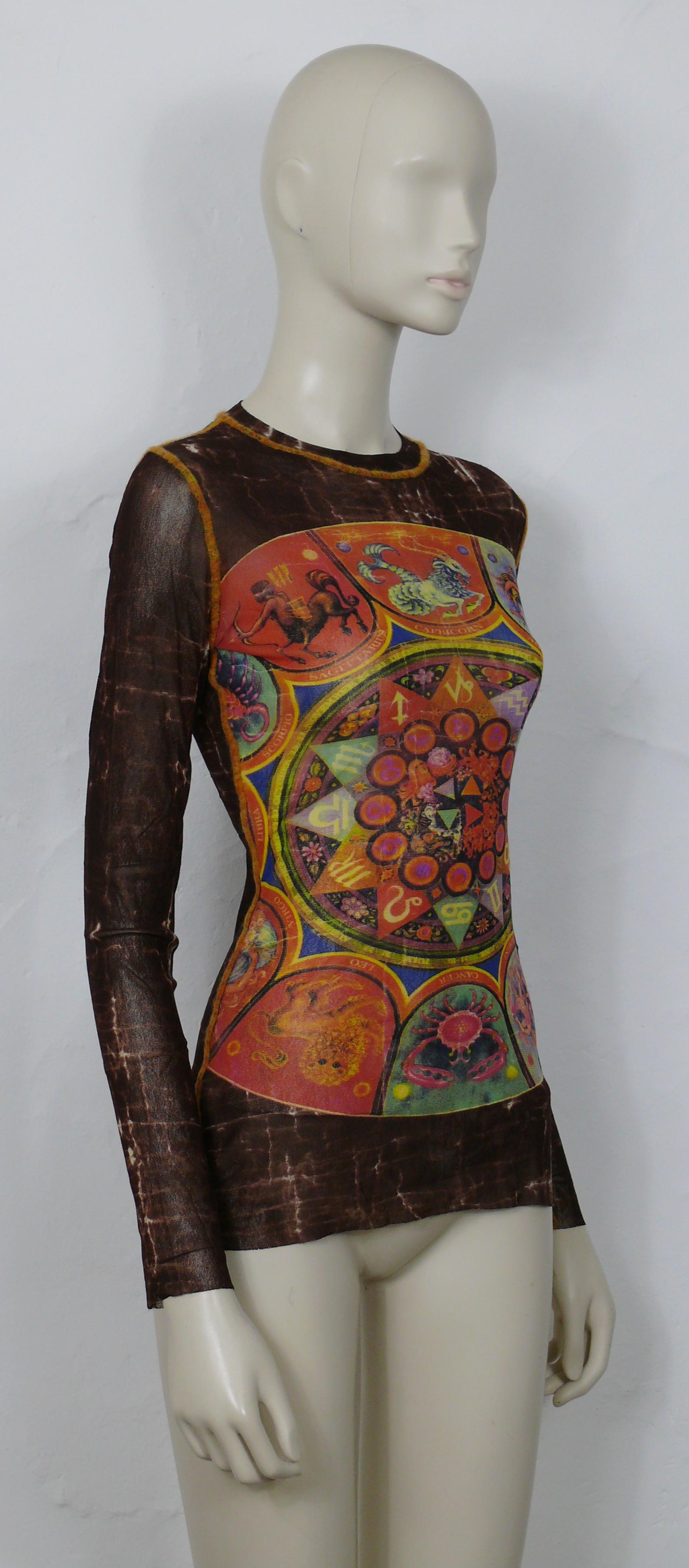 JEAN PAUL GAULTIER vintage marbled brown sheer mesh top featuring a multicolor zodiac print at the front.

Exposed seams.

Label reads JEAN PAUL GAULTIER MAILLE CLASSIQUE PARIS.
Made in Italy.

Size label reads : M.
Please refer to