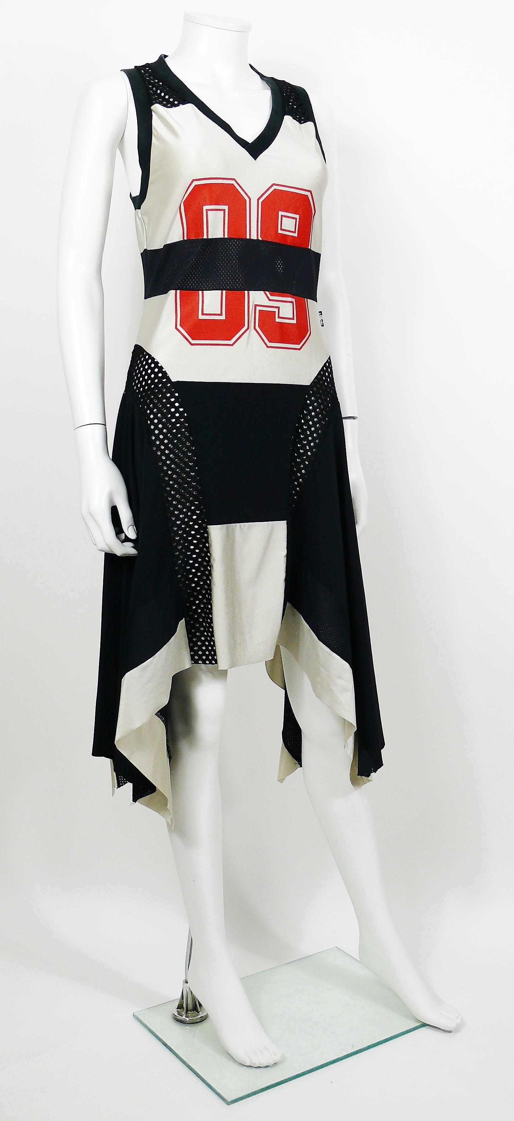 JEAN PAUL GAULTIER black and grey colour block basketball jersey asymetrical dress.

This dress features :
- V-neck.
- Racer back.
- Openwork mesh paneling to the front and rear.
- Large red 09 print to the front.

Label reads JPG JEAN'S COLLECTION