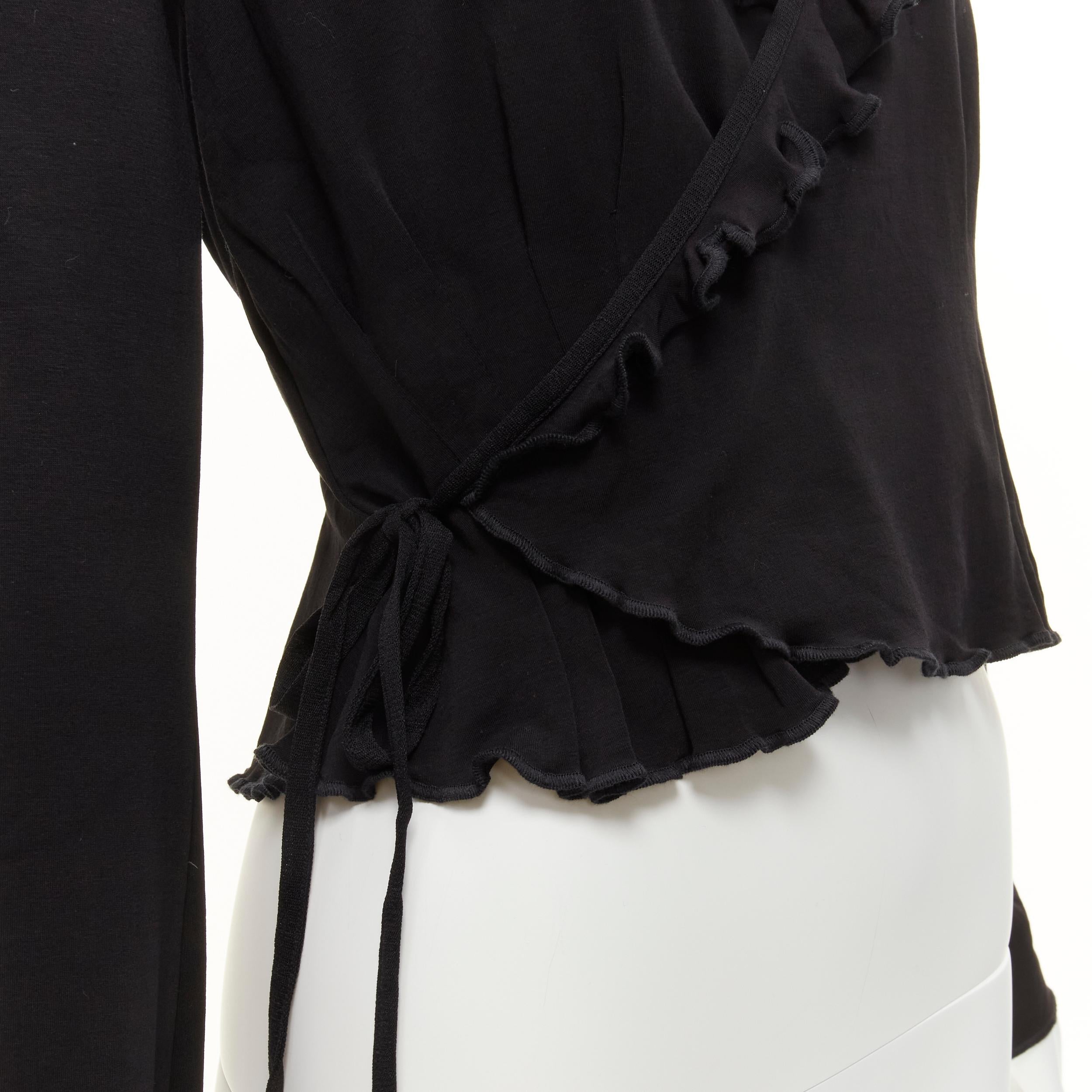 JEAN PAUL GAULTIER Vintage black jersey V neck lettuce ruffle wrap top IT40 S
Reference: TGAS/D00005
Brand: Jean Paul Gaultier
Designer: Jean Paul Gaultier
Material: Cotton
Color: Black
Pattern: Solid
Closure: Wrap Tie
Extra Details: Wrap tie