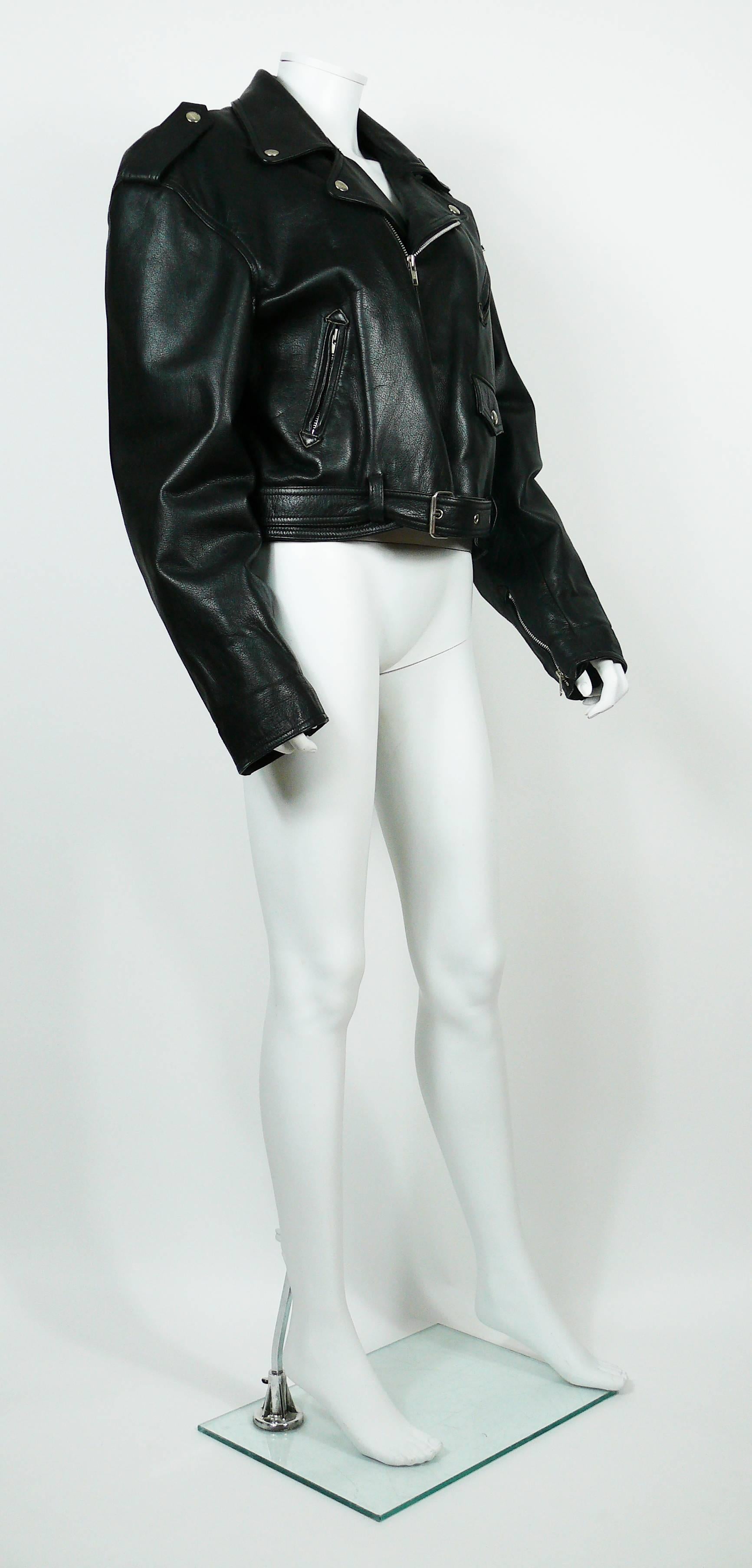 JEAN PAUL GAULTIER vintage black leather perfecto biker jacket.

This jacket features :
- Lapel collar.
- Long sleeves.
- Diagonal zip closing.
- Silver toned snap buttons embossed 
