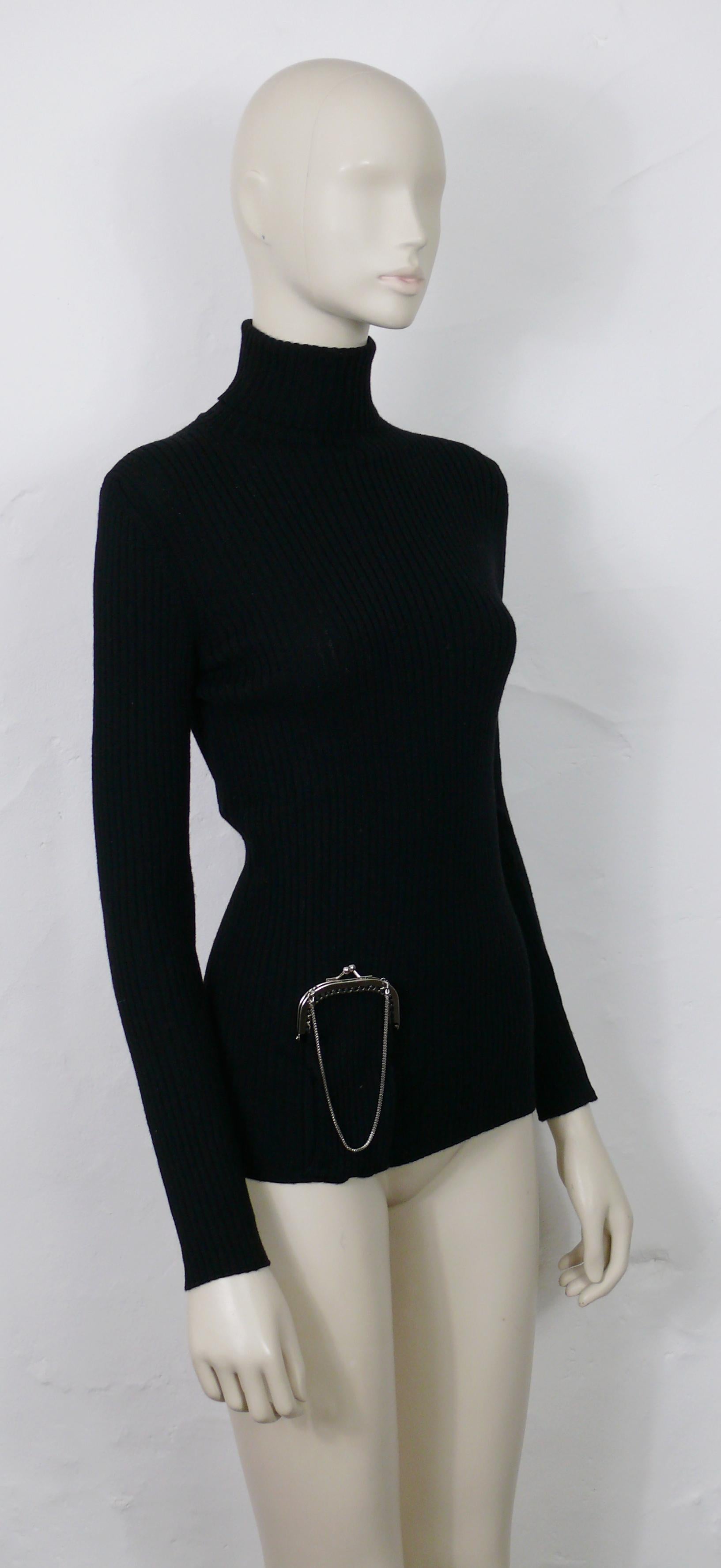 JEAN PAUL GAULTIER vintage black lightweight virgin wool turtleneck sweater featuring a kiss lock wallet pocket.

Label reads JEAN PAUL GAULTIER MAILLE Femme Made in Italy.

Composition tag reads : 100% Virgin Wool.

Size tag reads : L.
Please refer