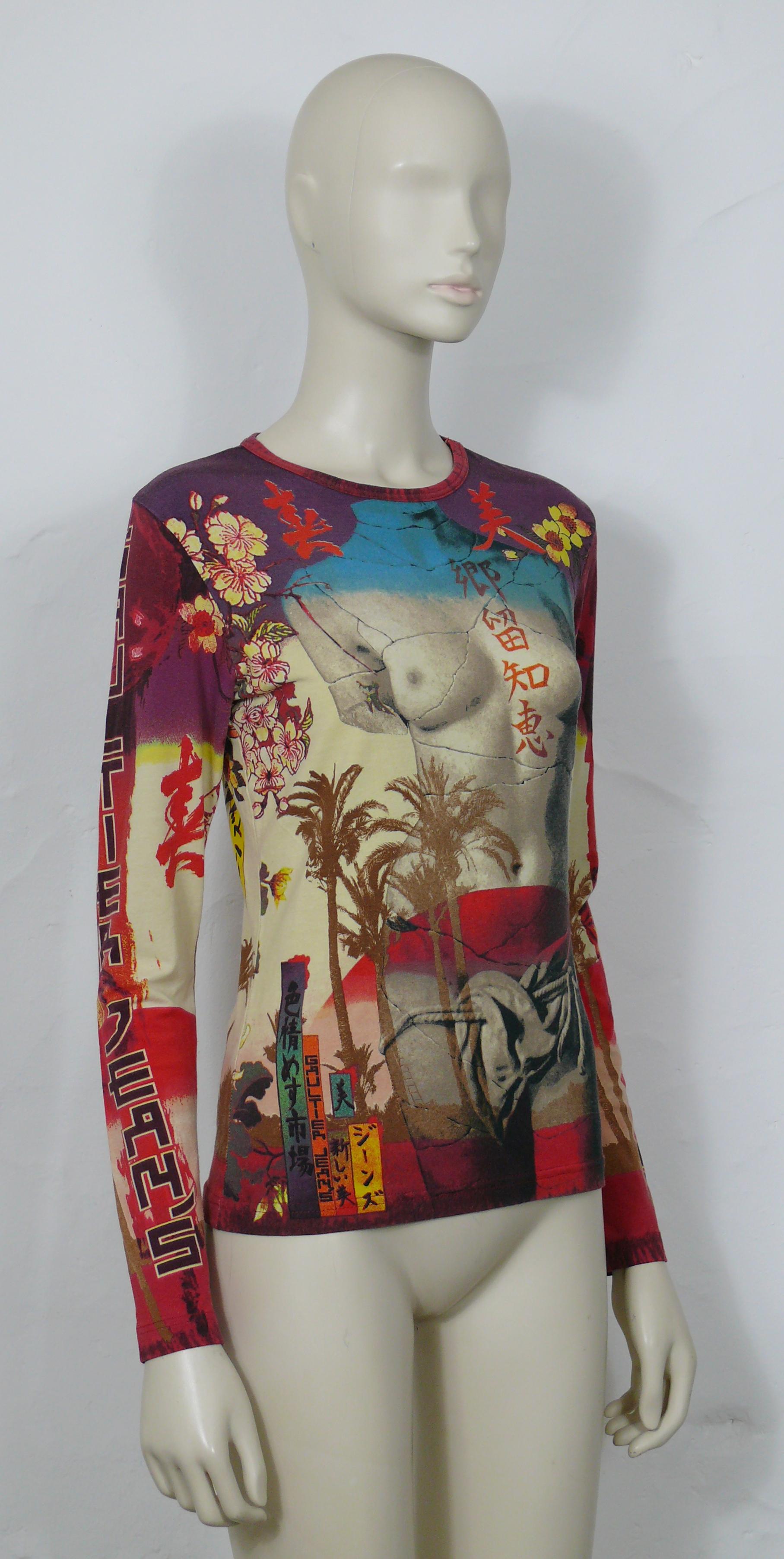 JEAN PAUL GAULTIER vintage top featuring a broken marble VENUS bust surrounded by palm trees, Japanese calligraphy, GAULTIER JEAN'S logo spelled out in Japanese style letters, cherry blossoms, butterflies and rising suns.

Label reads GAULTIER