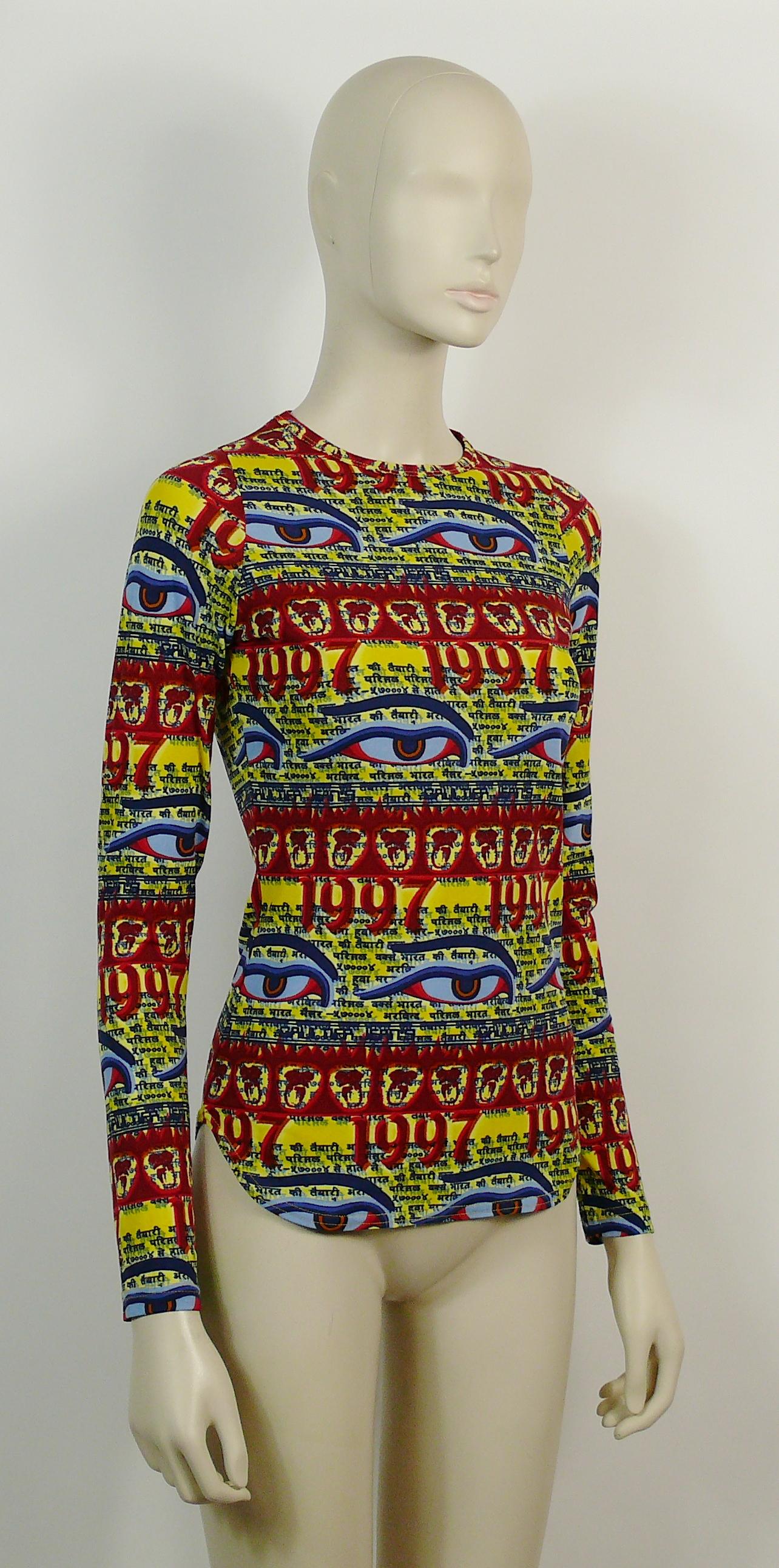 JEAN PAUL GAULTIER vintage 1997 top featuring multicolored Buddha Eyes and Tibetan words print on a yellow background.

Label reads GAULTIER JEAN'S.

Size tag reads : 38.
Please refer to measurements.

Missing composition tag.
Fabric has some