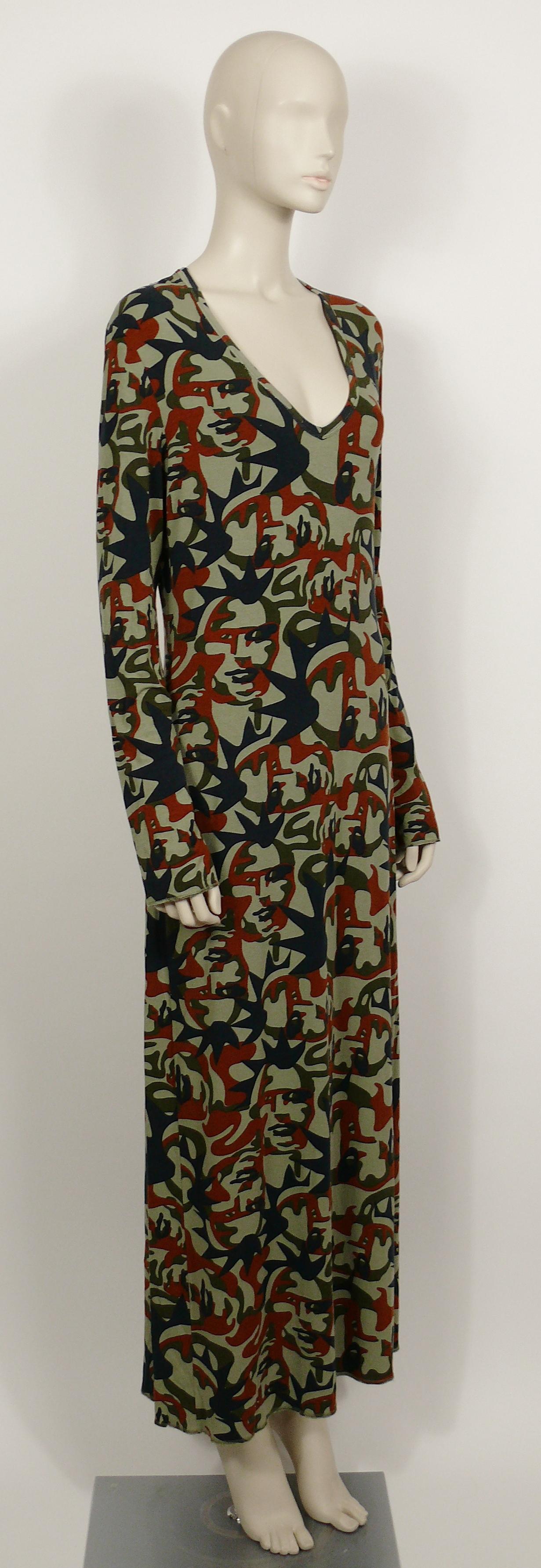 JEAN PAUL GAULTIER vintage maxi dress featuring a camouflage print with faces all-over.

Long sleeves, deep V neckline, no lining.

Slips on.
Has stretch.

Label reads JPG JEAN'S Collection N°0004.
Made in Italy.

Size tag reads : XL.

Composition