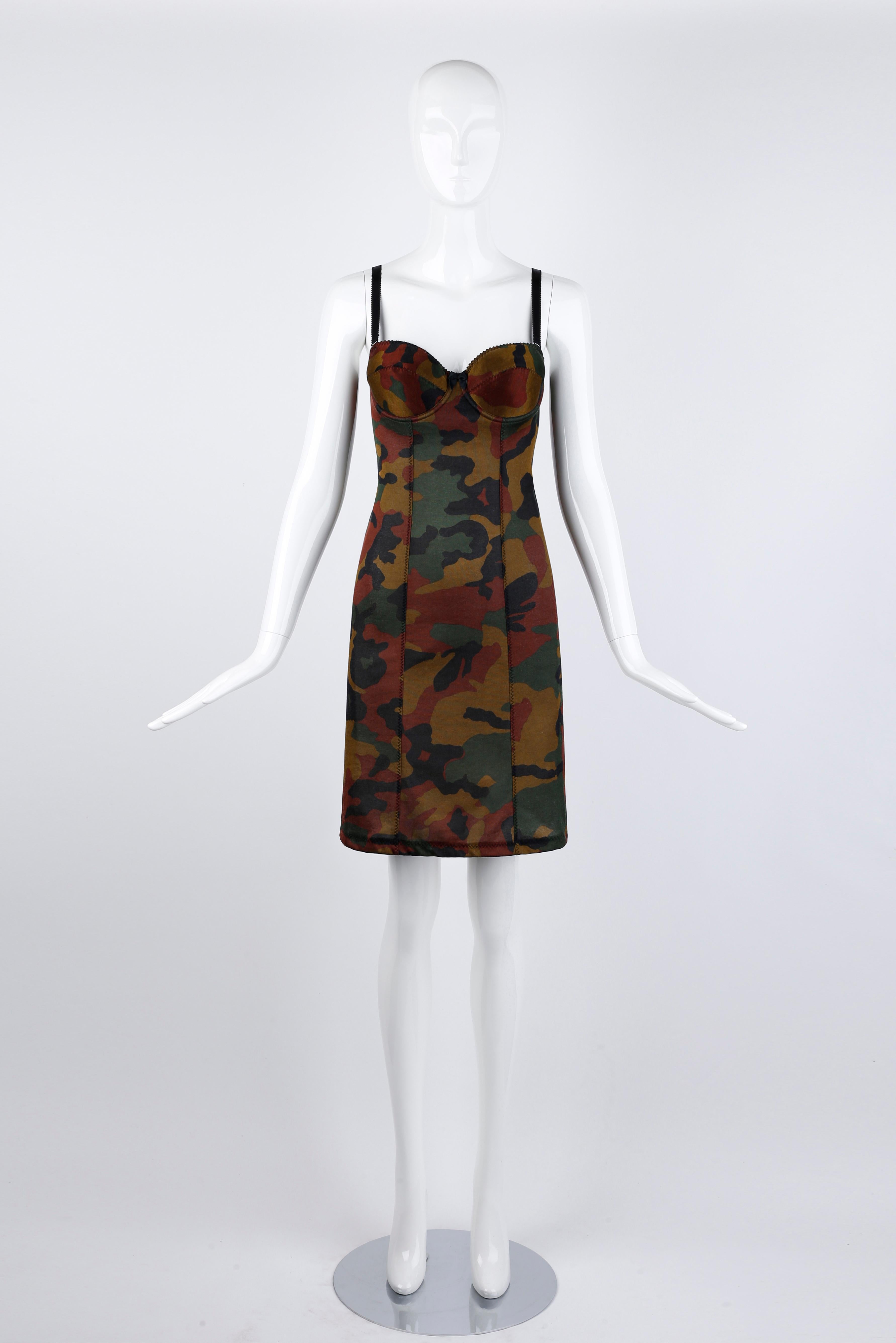 Designed by Jean Paul Gaultier Femme circa 1990's. Dress features a military-style color palette in camouflage print. A vintage camo print similar to the contemporary camo print seen in the spring/summer 2008 collection and again in the