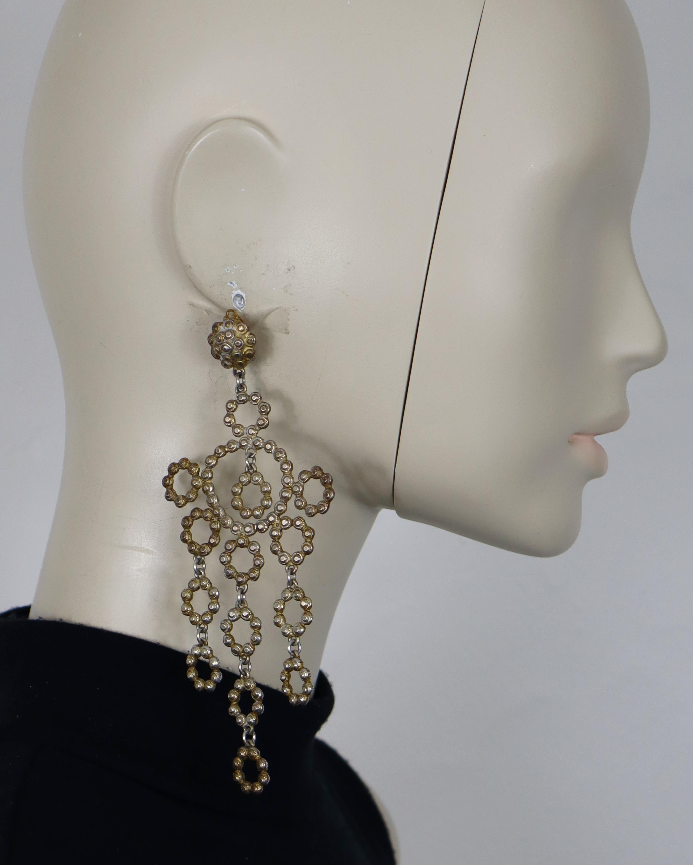 JEAN PAUL GAULTIER vintage distressed metal (silver tone with light golden patina) chandelier dangling earrings (clip-on).

Marked GAULTIER.

Indicative measurements : max. height approx. 13.5 cm (5.31 inches) / max. width approx. 5.5 cm (2.17