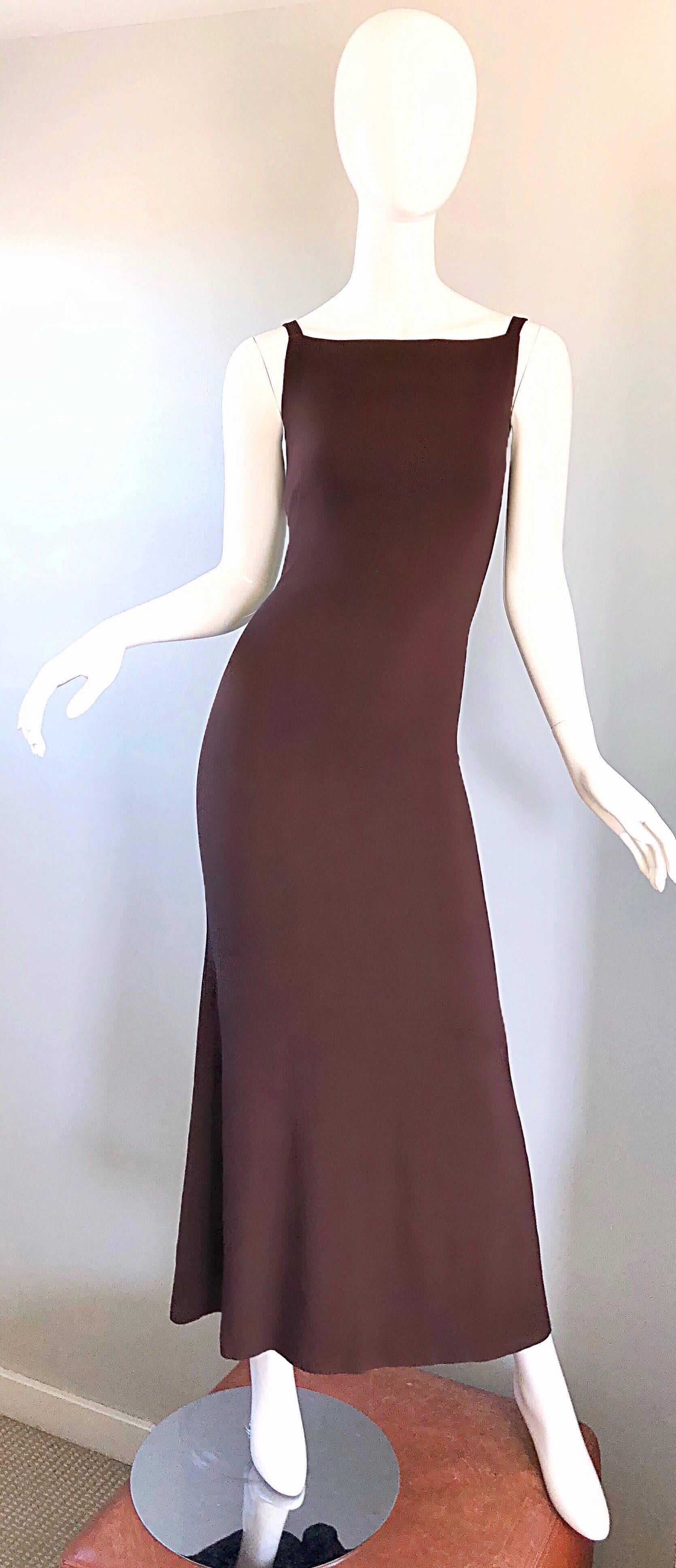 Sexy, yet sophisticated early 90s JEAN PAUL GAULTIER chocolate brown 'scar' full length evening dress! Features a form fitting bodice. Hidden zipper up the back with hook-and-eye closure. Features a 'scar' detail, which is shaped like a V just below