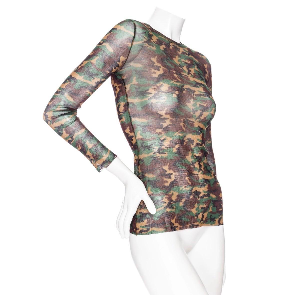 Jean Paul Gaultier Vintage Classique Green Camo Print Mesh Long Sleeve Top 

Vintage; circa 2000s
Brown/Tan/Green
Camo print
Long sleeve
Round neckline
Semi sheer
Stretch fit
Made in Italy
100% nylon
Excellent preowned vintage condition with little