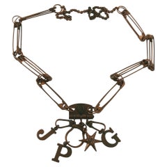 Collana con spille da balia e charms Jean Paul Gaultier Vintage in rame