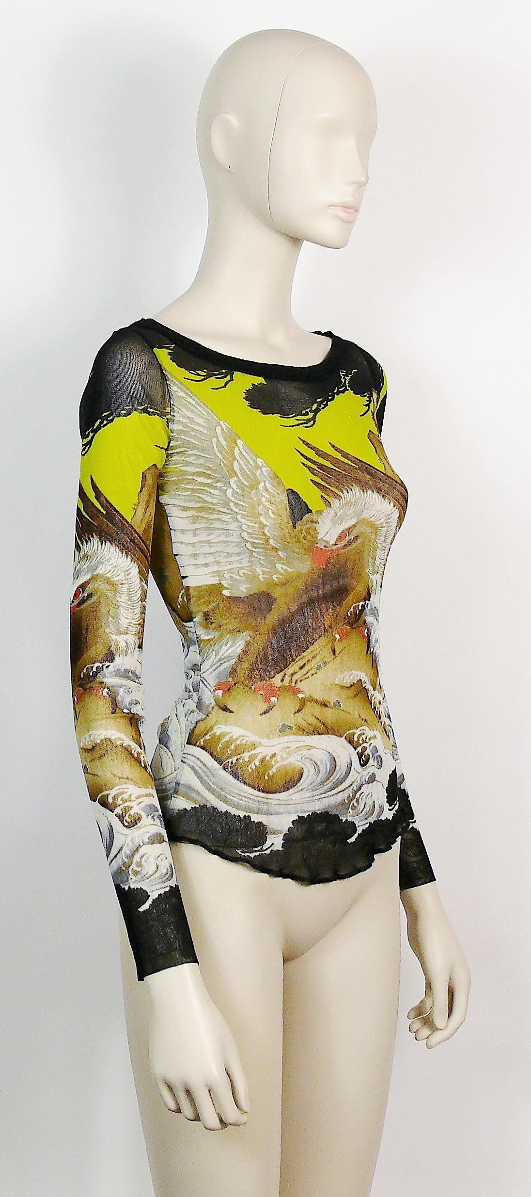 JEAN PAUL GAULTIER vintage eagle Japanese tattoo mesh top. 

Label reads JEAN PAUL GAULTIER Soleil.

Missing size label.
Please refer to measurements.

Missing composition tag (100% Nylon).

Indicative measurements taken laid flat and unstretched