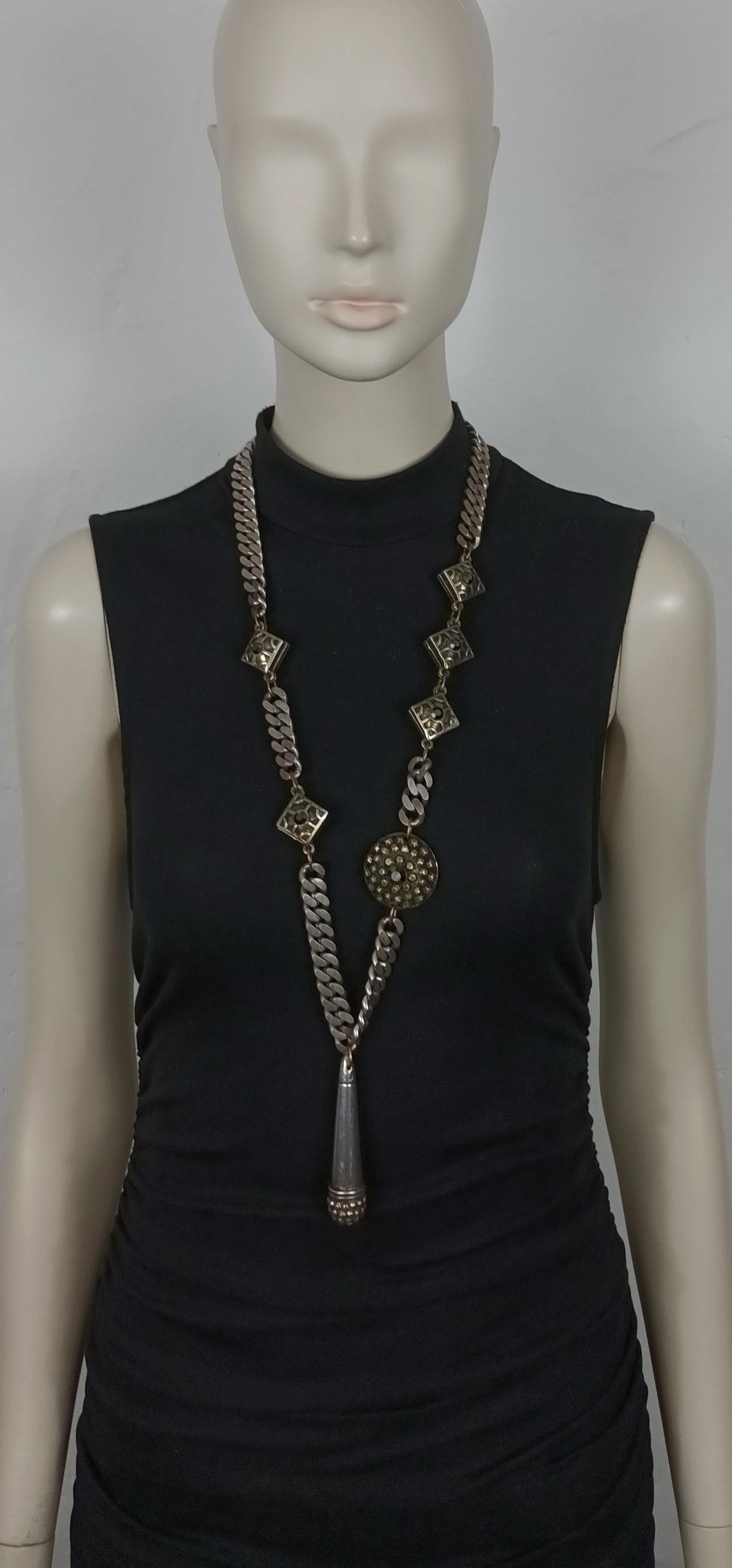 JEAN PAUL GAULTIER vintage antiqued silver tone chunky chain necklace featuring a resin ethnic disc, square links and a tubular drop pendant. Black crystal embellishment.

Slips on (no closure system).

Embossed JPG.

Indicative measurements :