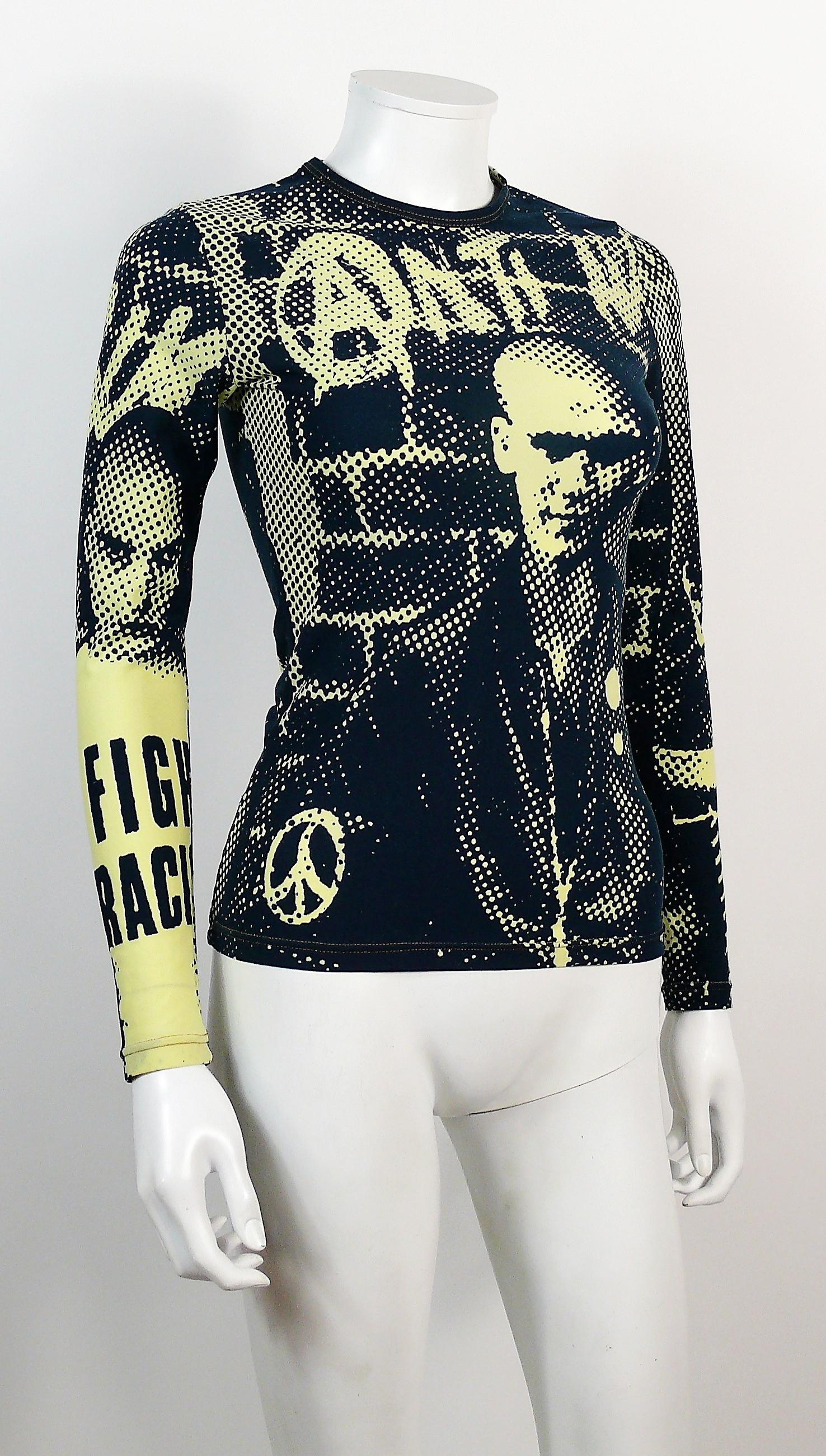 JEAN PAUL GAULTIER vintage long sleeve shirt from the Fight Racism Collection featuring a dark blue and green/yellow optical illusion print.

Round neck.
Stretchy material.

Label reads GAULTIER JEAN'S.
Made in France.

Size tag reads : 38.
Please