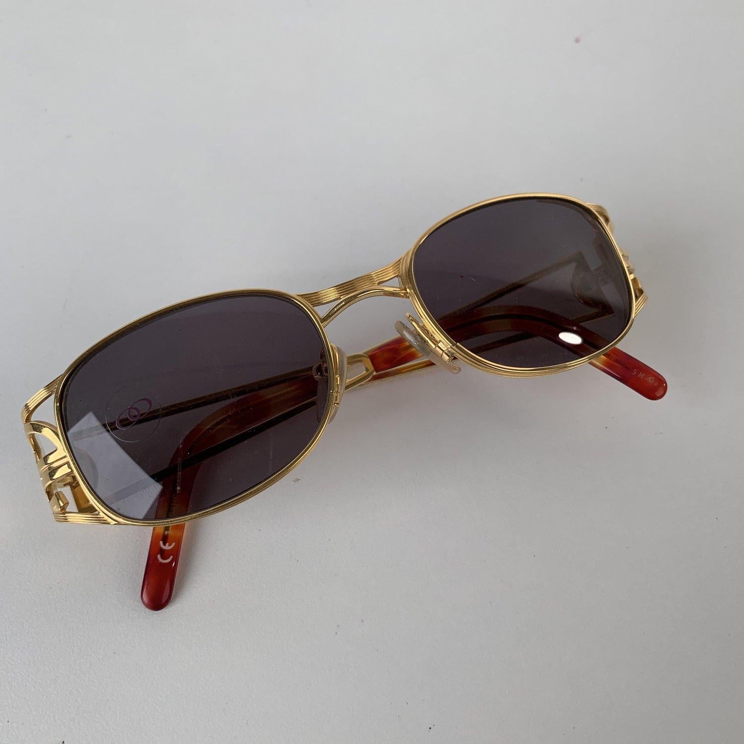 MATERIAL: Metal COLOR: Gold MODEL: 58-5101 GENDER: Adult Unisex SIZE: Medium Condition NOS (NEW OLD STOCK) - Never Worn or Used - They will come with a Generic Case Measurements TEMPLE MAX. LENGTH: 135 mm EYE / LENS MAX. WIDTH: 50 mm EYE / LENS MAX.