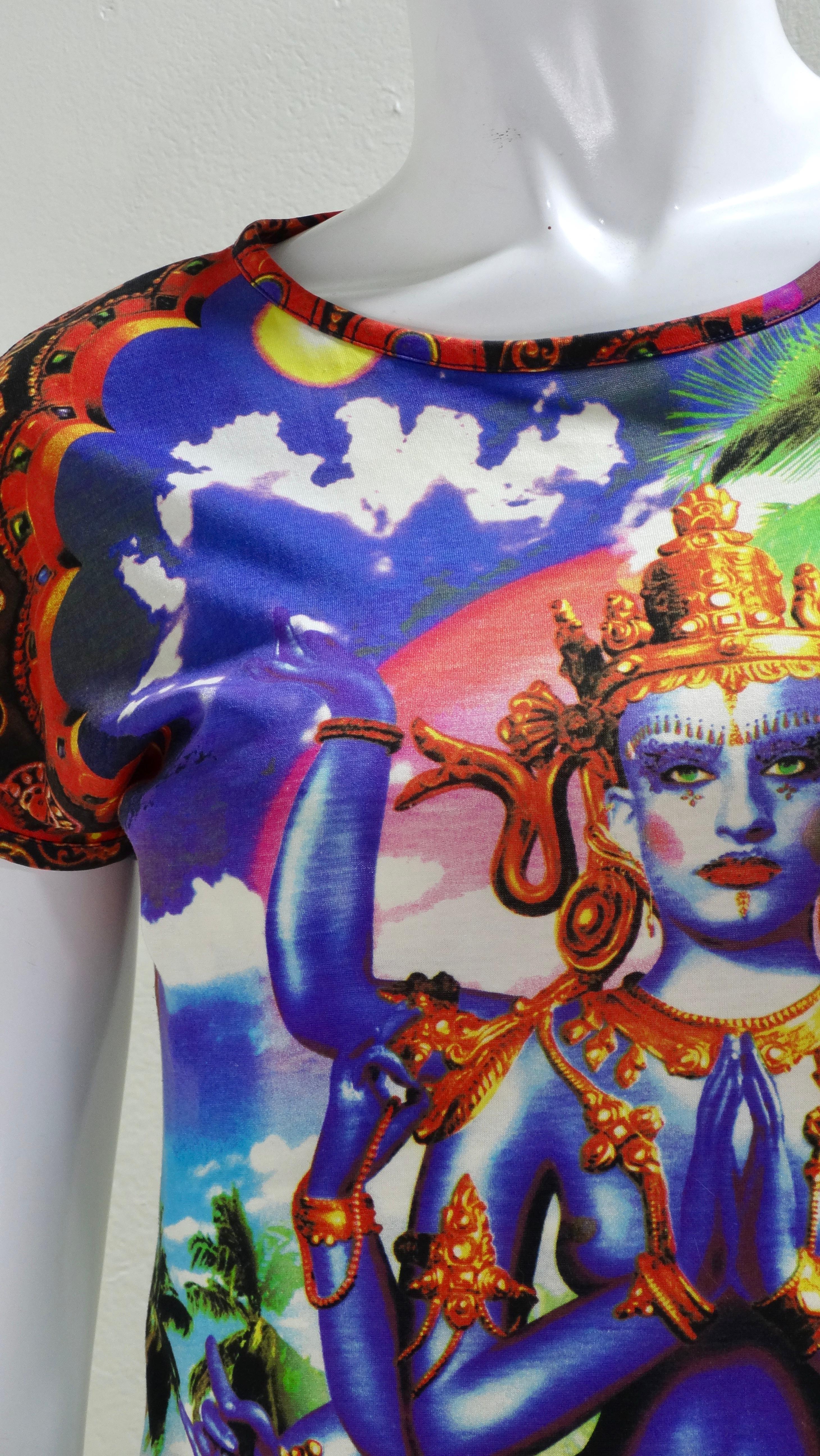 Gaultier lovers, this is just for you! This top shows Gaultier’s long running fascination with extravagant prints and use of stretchy malleable material. This top features a vibrant neon Hindu God print in a slightly cropped fit and a t-shirt
