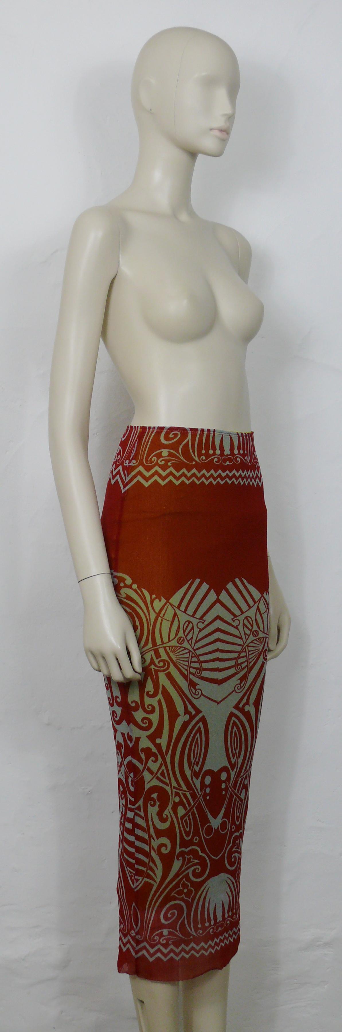 JEAN PAUL GAULTIER vintage FUZZI mesh skirt featuring a tribal tattoo print.

Slips on.
Mustard yellow color lining.

Label reads JEAN PAUL GAULTIER MAILLE.
Made in Italy.

Size label reads : S.
Please refer to measurements.

Missing composition tag