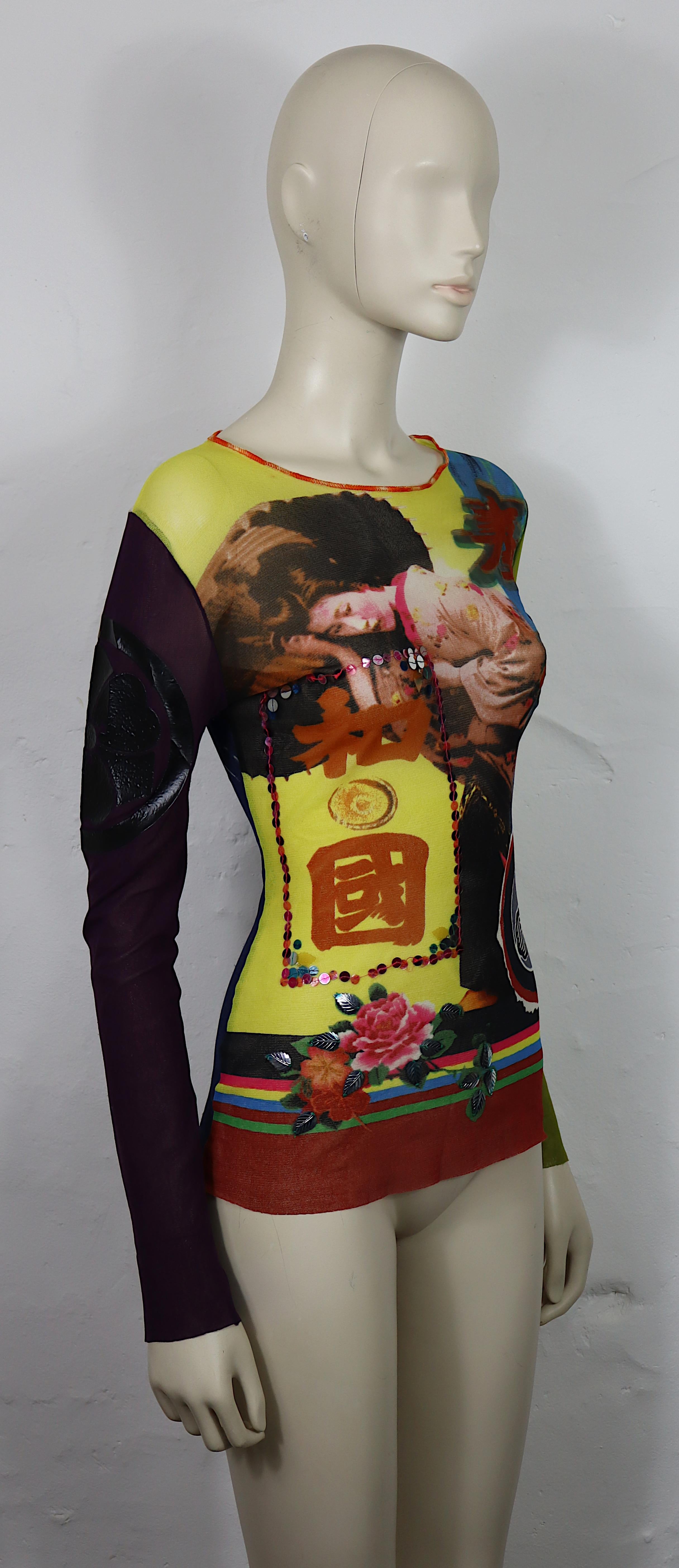 JEAN PAUL GAULTIER vintage sheer mesh nylon top featuring a colorful Japanese print embellished with sequins and flocked ideograms/symbols.

Label reads JEAN PAUL GAULTIER Maille Made in Italy.

Size label reads : S.

Composition and care label is