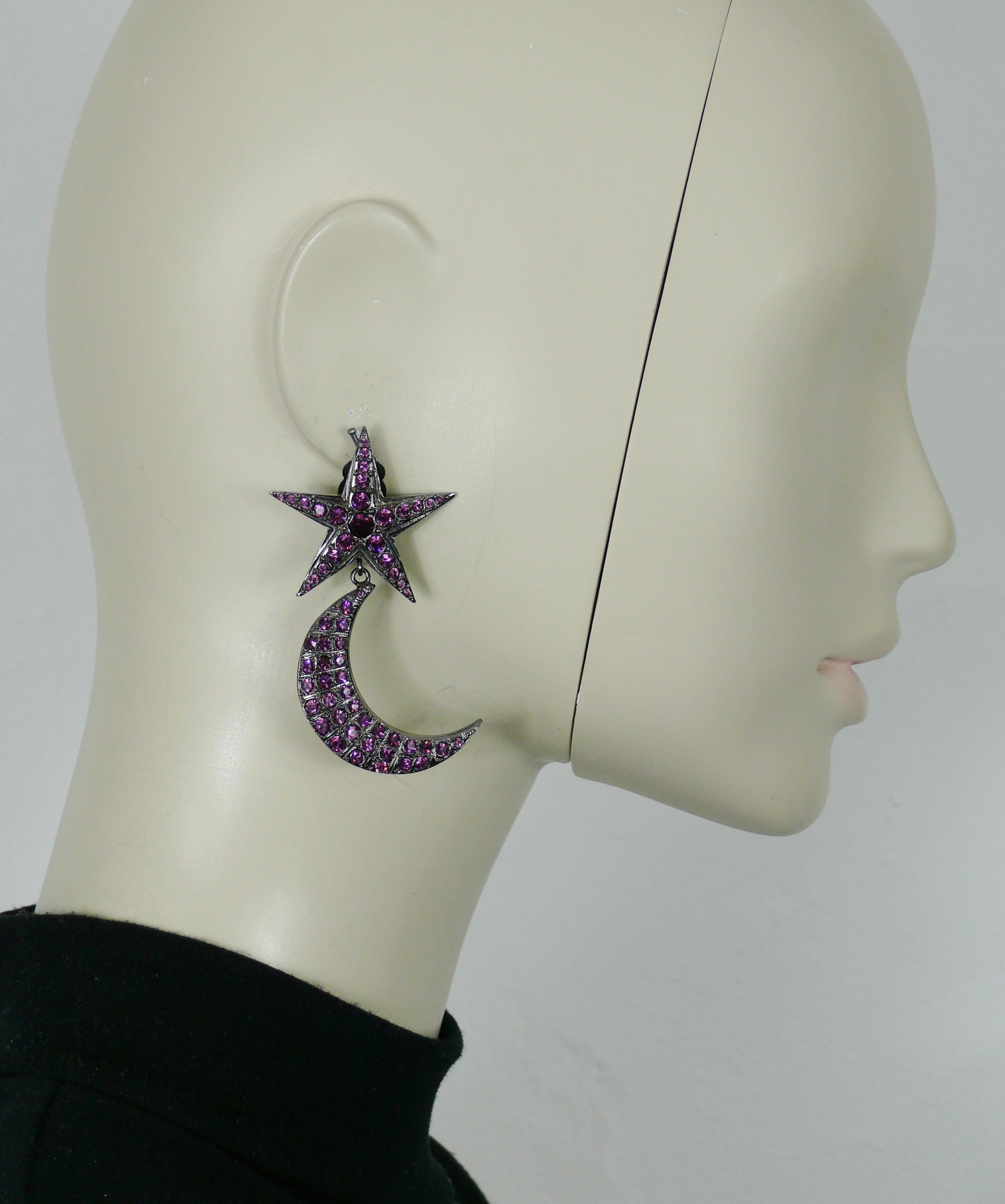 JEAN PAUL GAULTIER vintage gun tone dangling earrings (clip-on) featuring a star top and a crescent moon embellished with amethyst color crystals.

Marked GAULTIER.

Indicative measurements : max. height approx. 6.8 cm (2.68 inches) / max. width