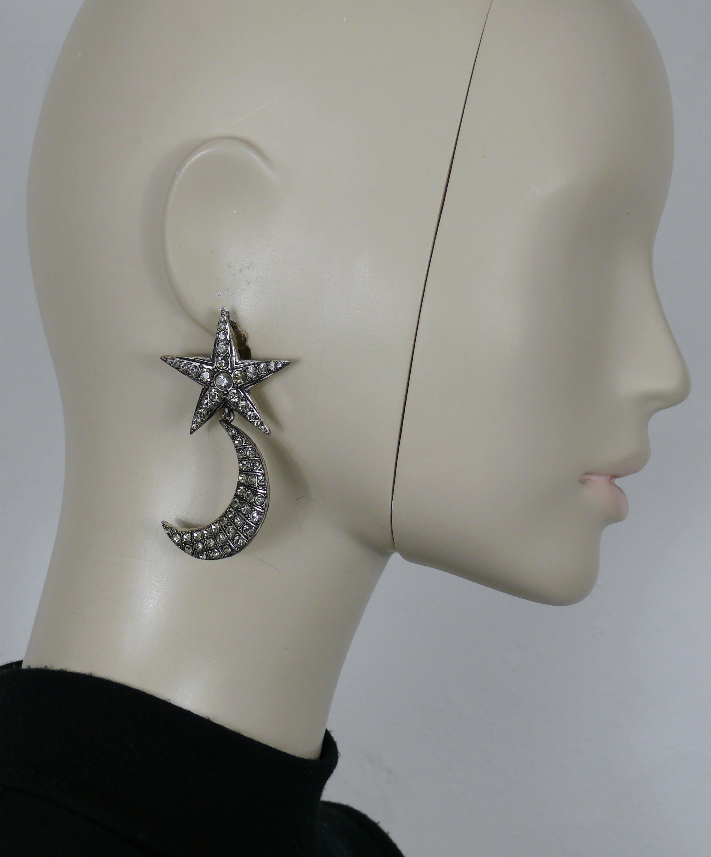 JEAN PAUL GAULTIER vintage antiqued silver tone dangling earrings (clip-on) featuring a star top and a crescent moon embellished with crystals (probably very light grey color ?).

Marked GAULTIER.

Indicative measurements : max. height approx. 6.8