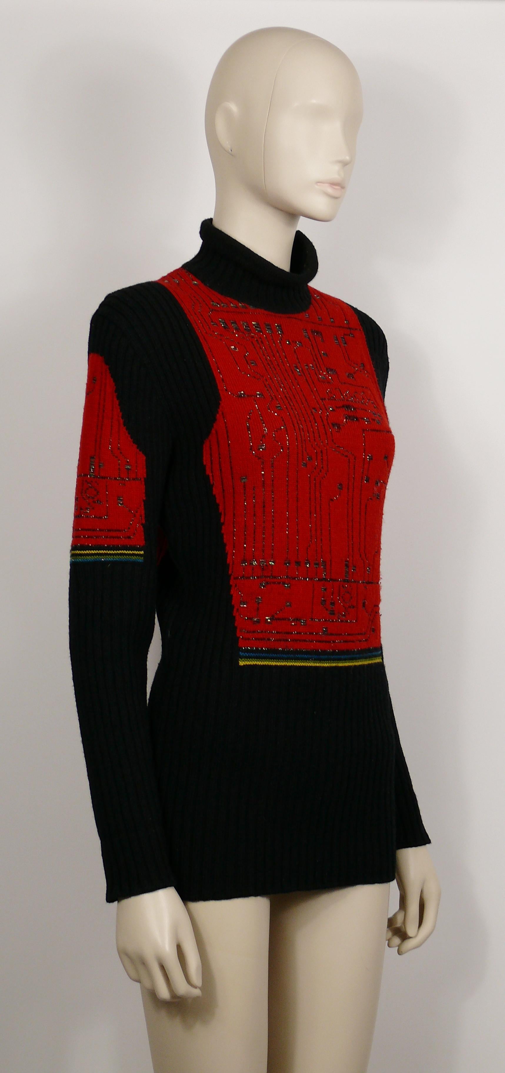 JEAN PAUL GAULTIER vintage black and red wool knit sweater featuring a circuit board pattern on front, back and sleeves.

Shoulder pads (removable).

Label reads JEAN PAUL GAULTIER MAILLE Made in Italy.

Composition label reads : 96% Wool / 4%