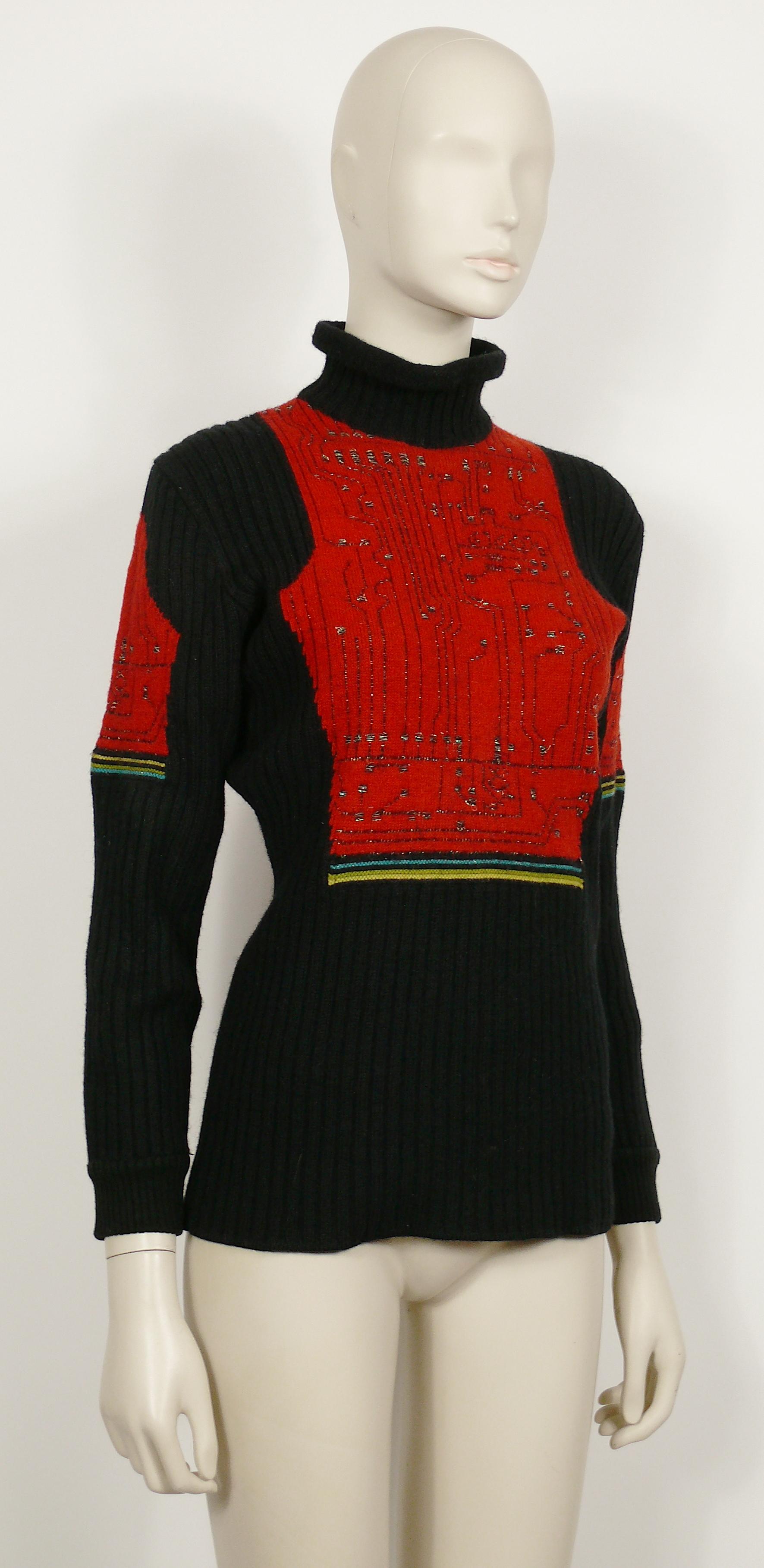JEAN PAUL GAULTIER vintage black and red wool knit sweater featuring a circuit board pattern on front, back and sleeves.

Label reads JEAN PAUL GAULTIER MAILLE Made in Italy.

Composition label reads : 96% Wool / 4% Polyester.

Size label reads :