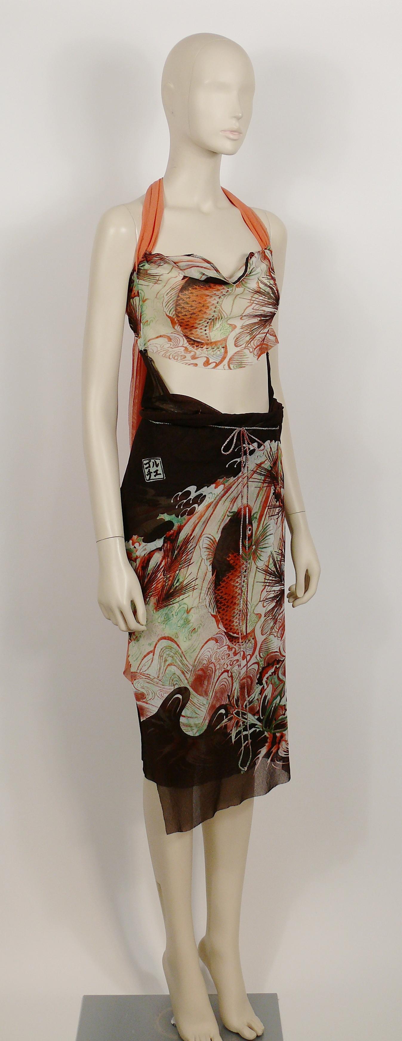 JEAN PAUL GAULTIER vintage koi fish tattoo sheer mesh Summer beach dress.

The bustier top ties with long orange straps around the neck, back or front...
The skirt part wraps around with spaghetti straps.

Label reads JEAN PAUL GAULTIER SOLEIL.
Made