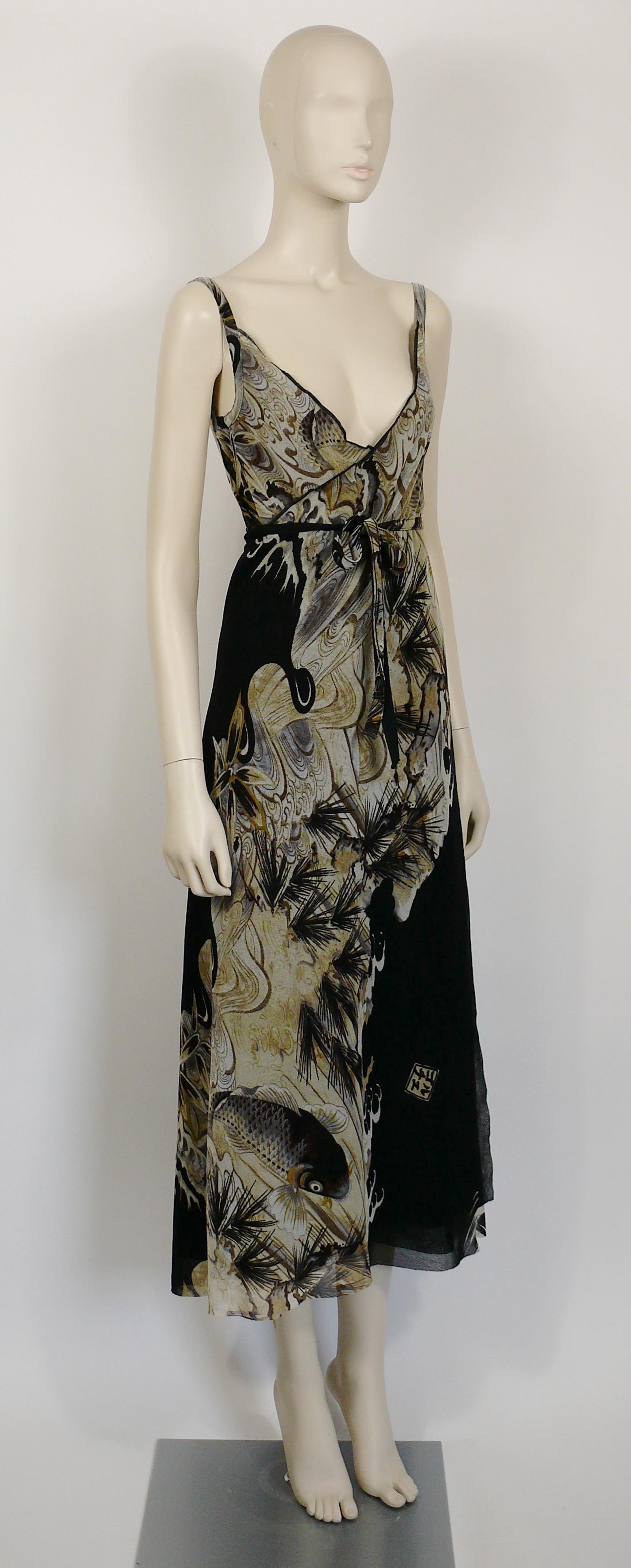 JEAN PAUL GAULTIER vintage koi fish tattoo sheer mesh wrap dress.

Label reads JEAN PAUL GAULTIER SOLEIL.
Made in Italy.

Size label reads : M.

Composition tag reads : 100% Nylon.

NOTES
- This is a preloved vintage item, therefore it might have