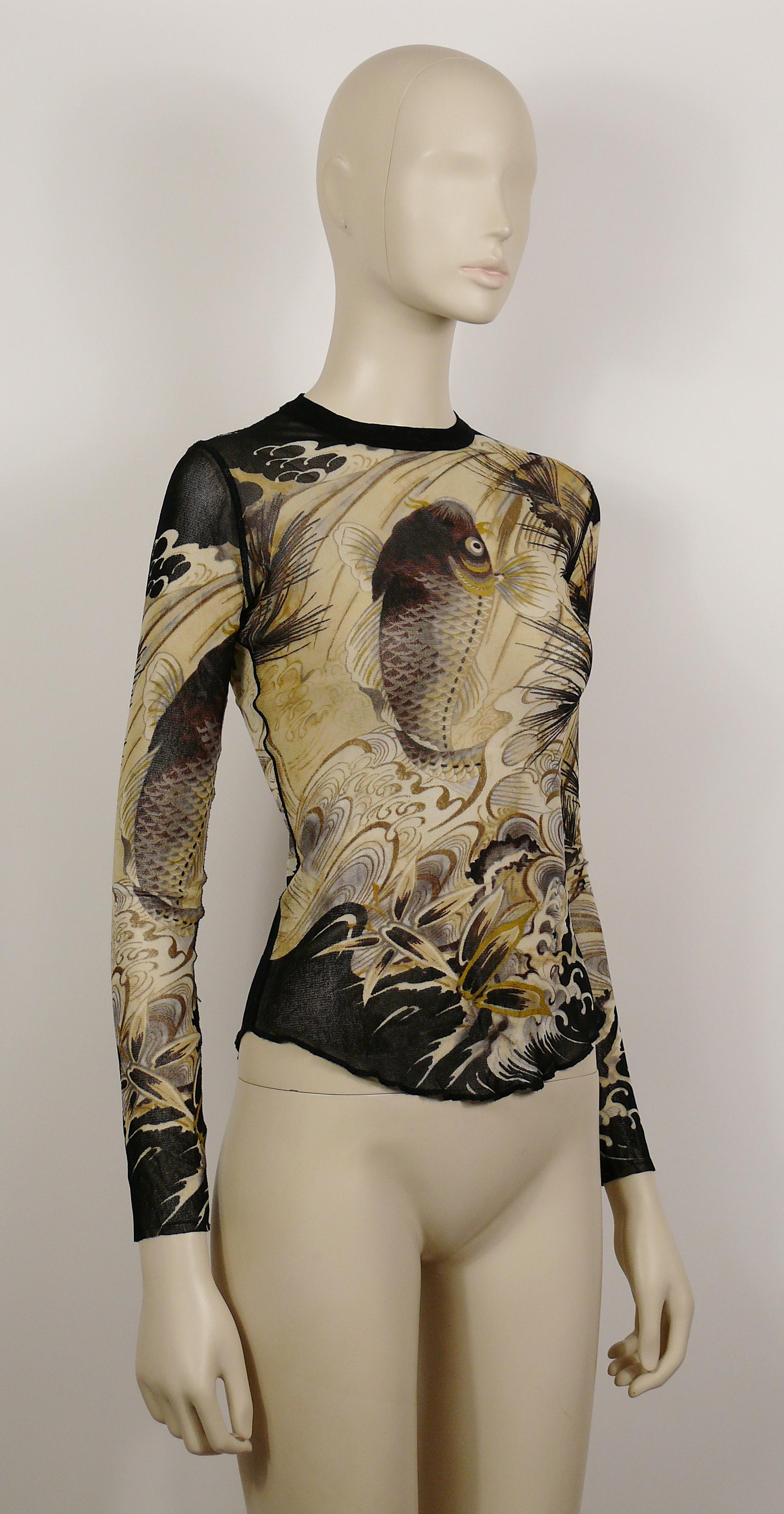 JEAN PAUL GAULTIER vintage koi tattoo mesh top. 

Label reads JEAN PAUL GAULTIER Soleil.
Made in Italy.

Size label reads : S.
Please refer to measurements.

Composition tag reads : 100% Nylon.

Indicative measurements taken laid flat and