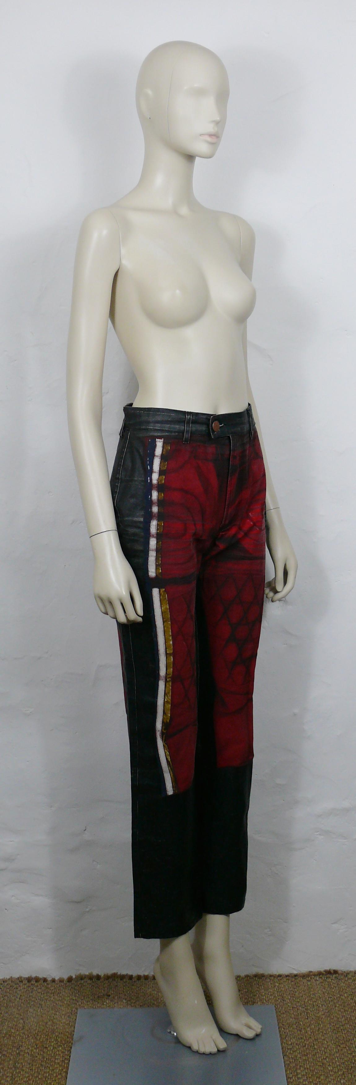 JEAN PAUL GAULTIER vintage coated denim pants trousers featuring a motorcycle jeans pattern trompe l'œil on front and back.

These trousers feature :
- Black coated denim trousers featuring a red motorcycle jeans pattern trompe l'œil on front and