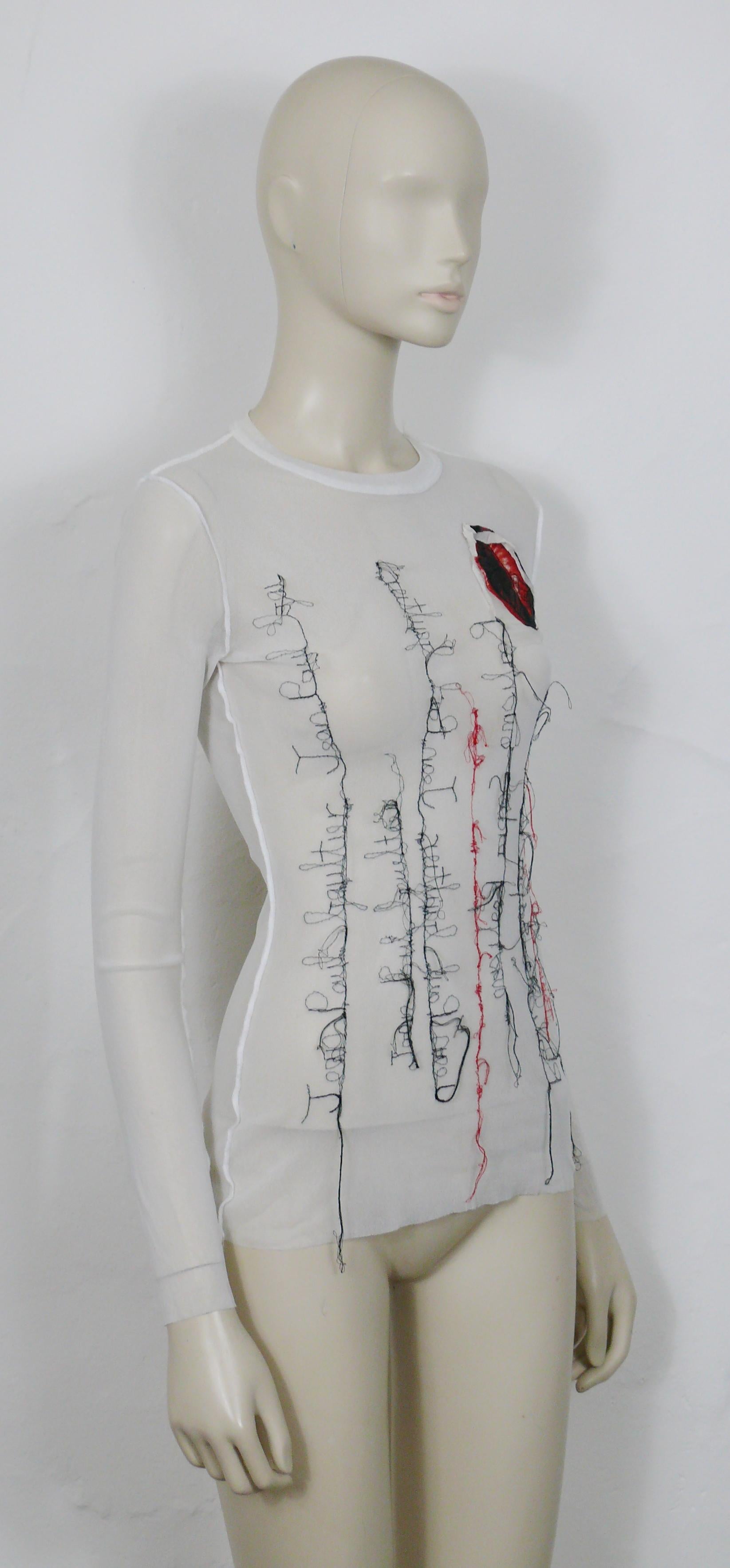 JEAN PAUL GAULTIER vintage white FUZZI sheer mesh top featuring a mouth applique and JEAN PAUL GAULTIER cursive signature embroideries.

Label reads JEAN PAUL GAULTIER Maille Femme.
Made in Italy.

Size label reads : L.
Please refer to