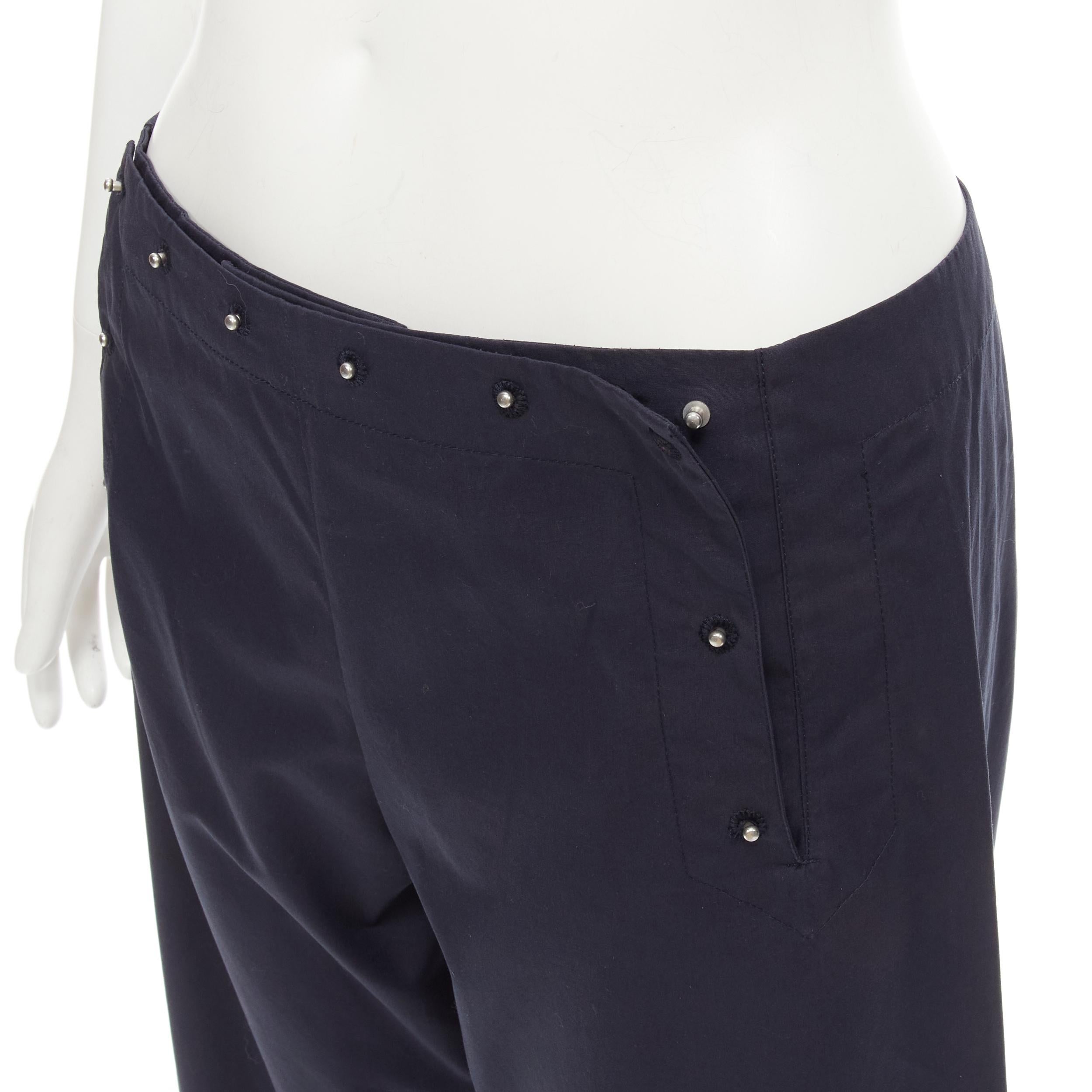 JEAN PAUL GAULTIER Vintage navy silver button wide leg nautical pants IT42 M 
Reference: AEMA/A00099 
Brand: Jean Paul Gaultier 
Material: Cotton 
Color: Navy 
Pattern: Solid 
Closure: Pin button 
Extra Detail: Silver-tone pin buttons on front flap.