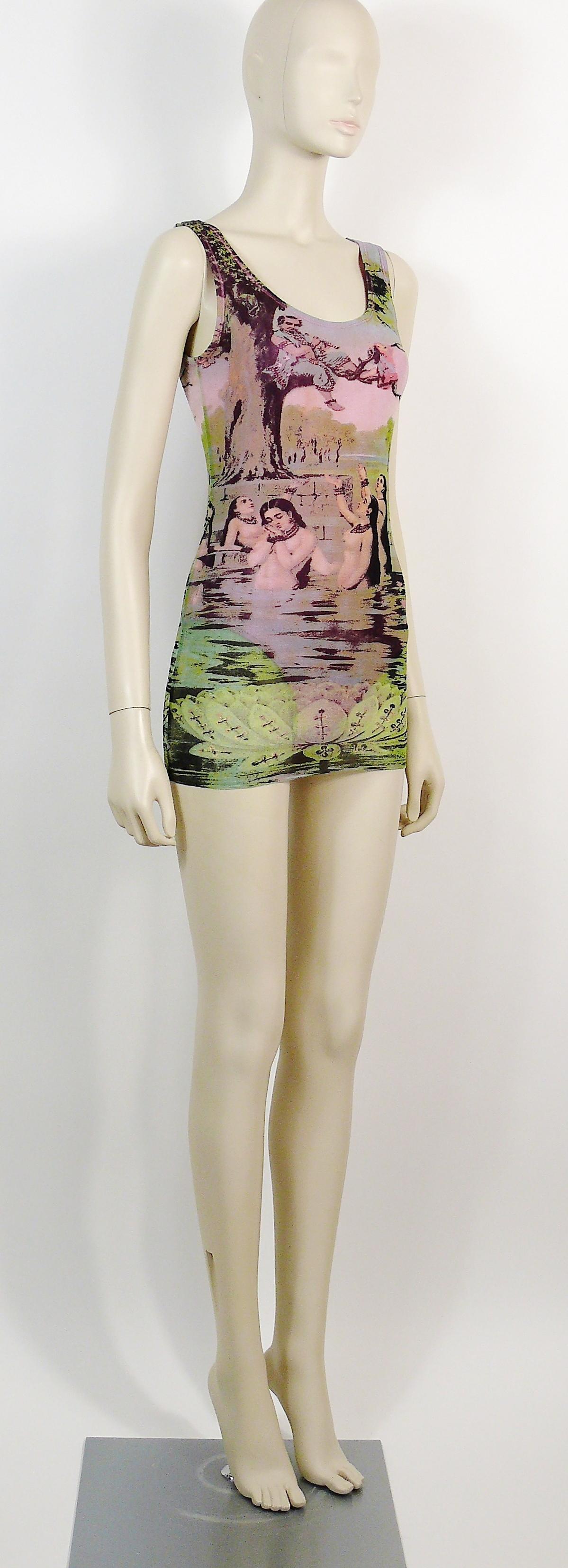 JEAN PAUL GAULTIER vintage FUZZI mesh tank micro mini dress featuring a gorgeous Oriental Bath scene print.

This dress is fully lined with a pink nylon bodysuit (snap button closure).

Label reads JEAN PAUL GAULTIER MAILLE Made in Italy.

Size tag