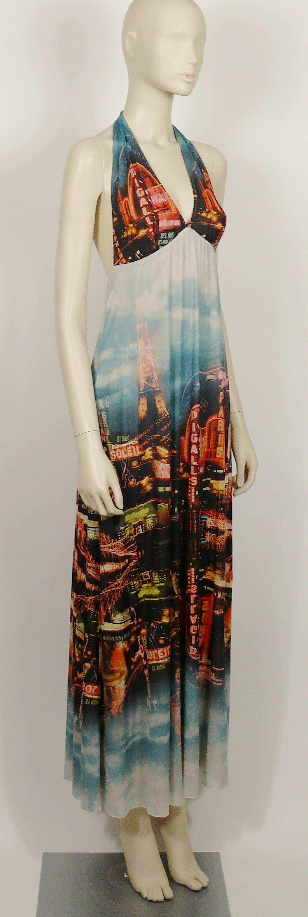 JEAN PAUL GAULTIER vintage dress featuring a gorgeous Paris by night cabarets and Eiffel Tower view print.

Slips on.
Pale pink lining.
Has stretch.

Label reads JEAN PAUL GAULTIER SOLEIL.
Made in Italy.

Size label reads : M.
Please refer to