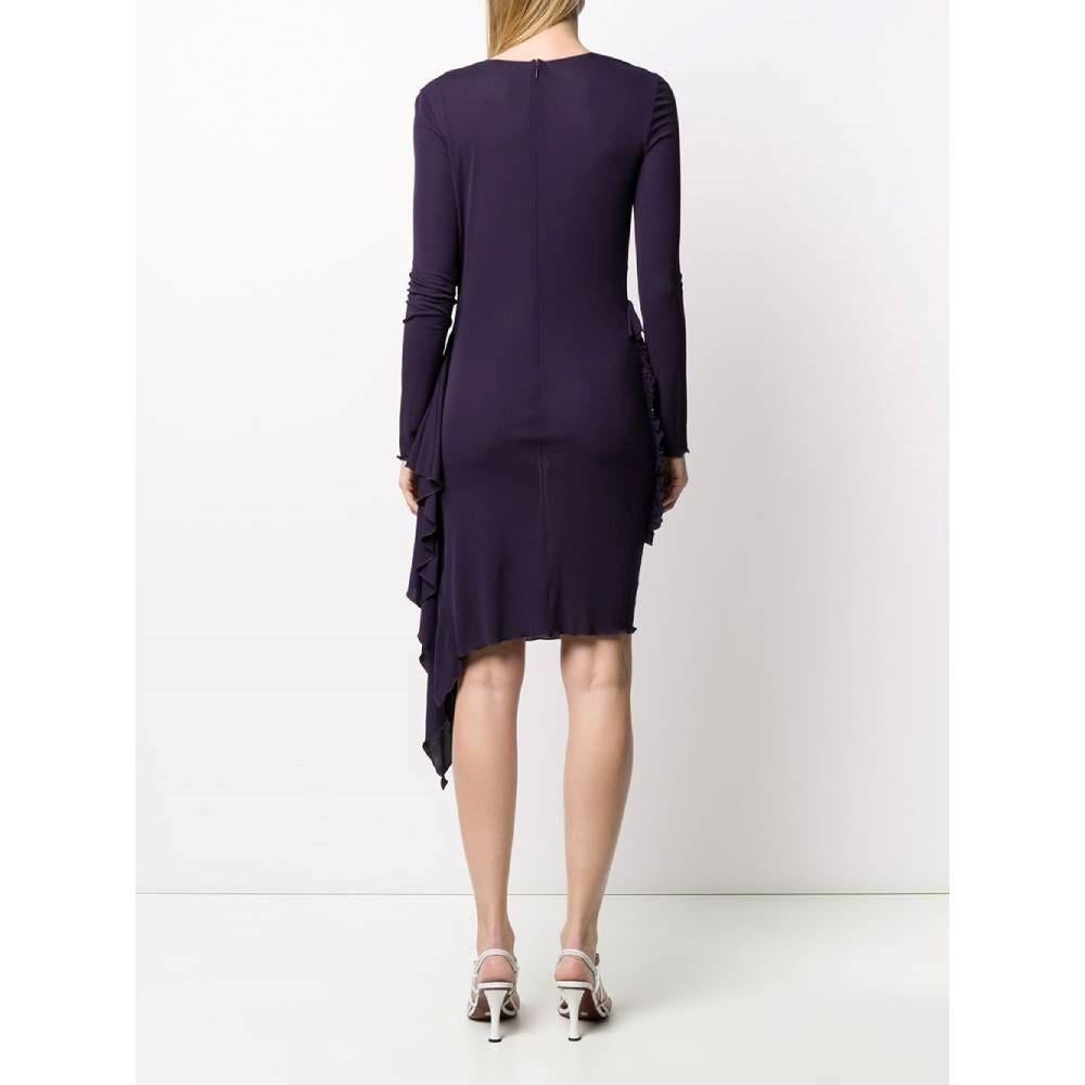 Jean Paul Gaultier purple rayon 90s midi dress with cowl neck, long sleeves, side gathering and drape. Back zip fastening.

Size: 40 IT

Flat measurements
Height: 98 cm
Bust: 43 cm
Sleeves: 63 cm
Shoulders: 37 cm

Product code: A7464

Composition: