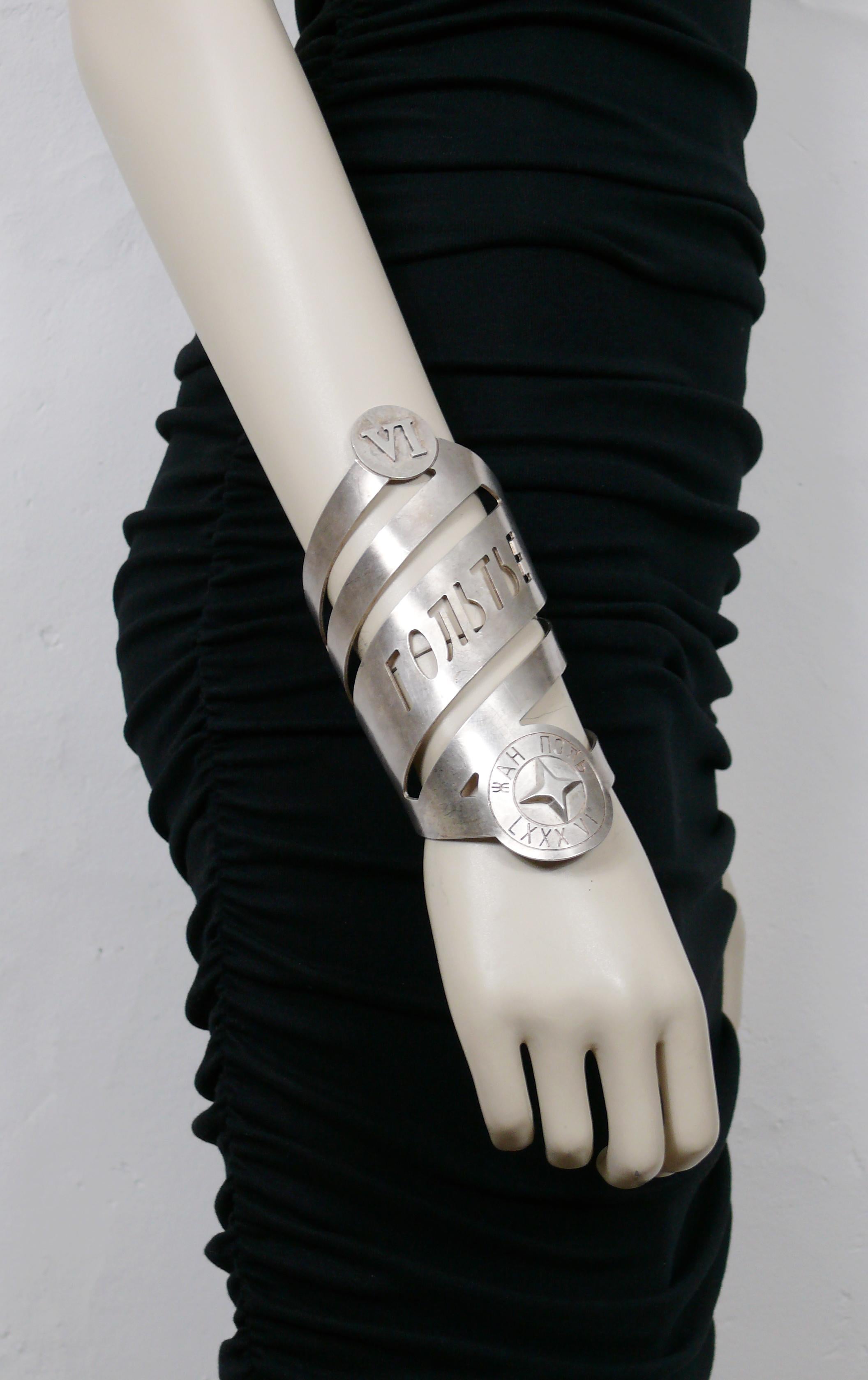 JEAN PAUL GAULTIER (attributed to) vintage rare cuff bracelet from the Autumn/Winter 1986 Russian Constructivism collection.

This bracelet features the signature JEAN PAUL GAULTIER in in Cyrillic characters and the number 86 in roman numerals