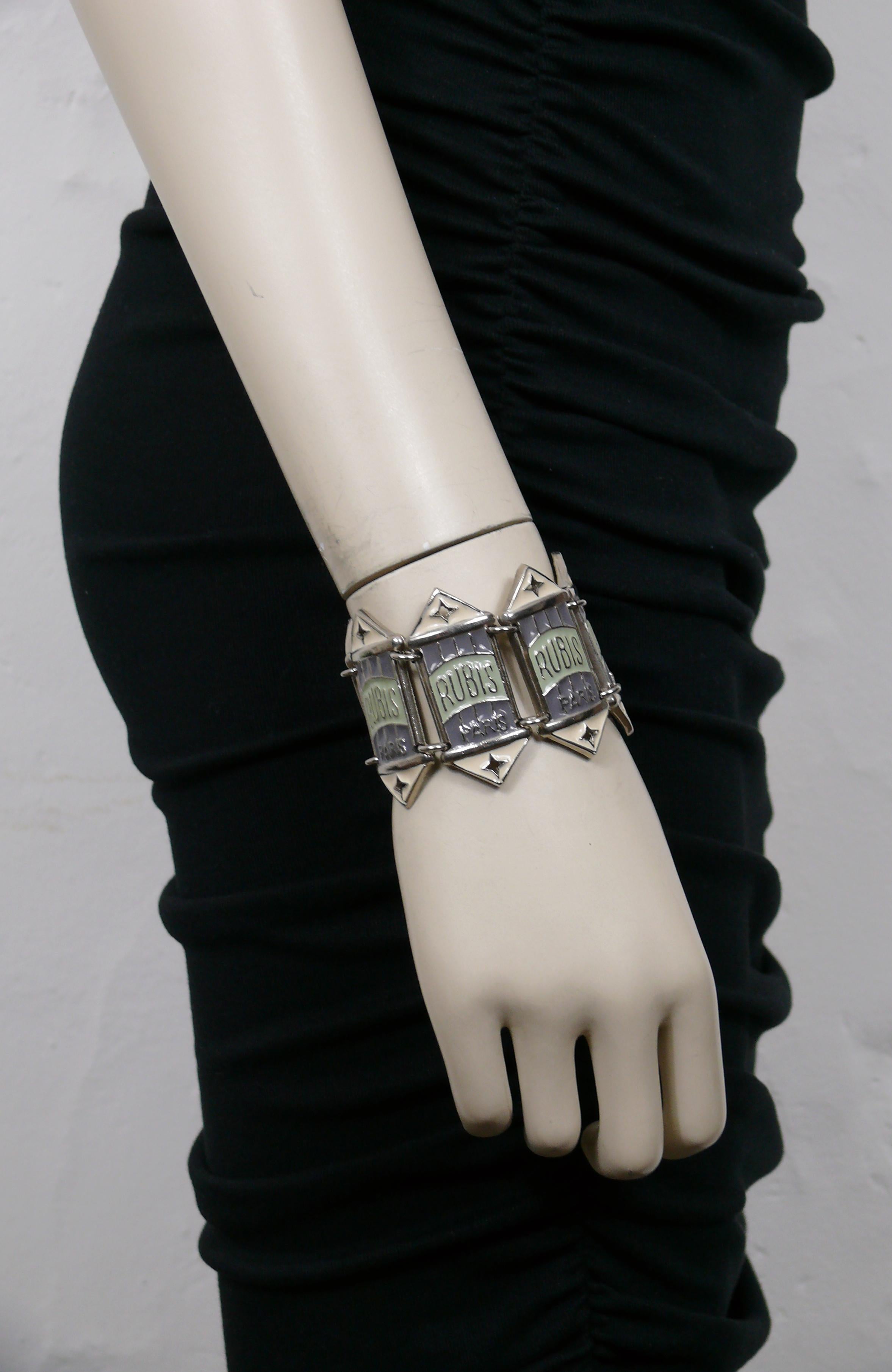 JEAN PAUL GAULTIER vintage RUBIS PARIS silver tone cuff bracelet featuring green, off-white and grey enameled links.

Box clasp closure.

Embossed JPG on the reveres of each links.

Indicative measurements : length approx. 16.3 cm (6.42 inches) /