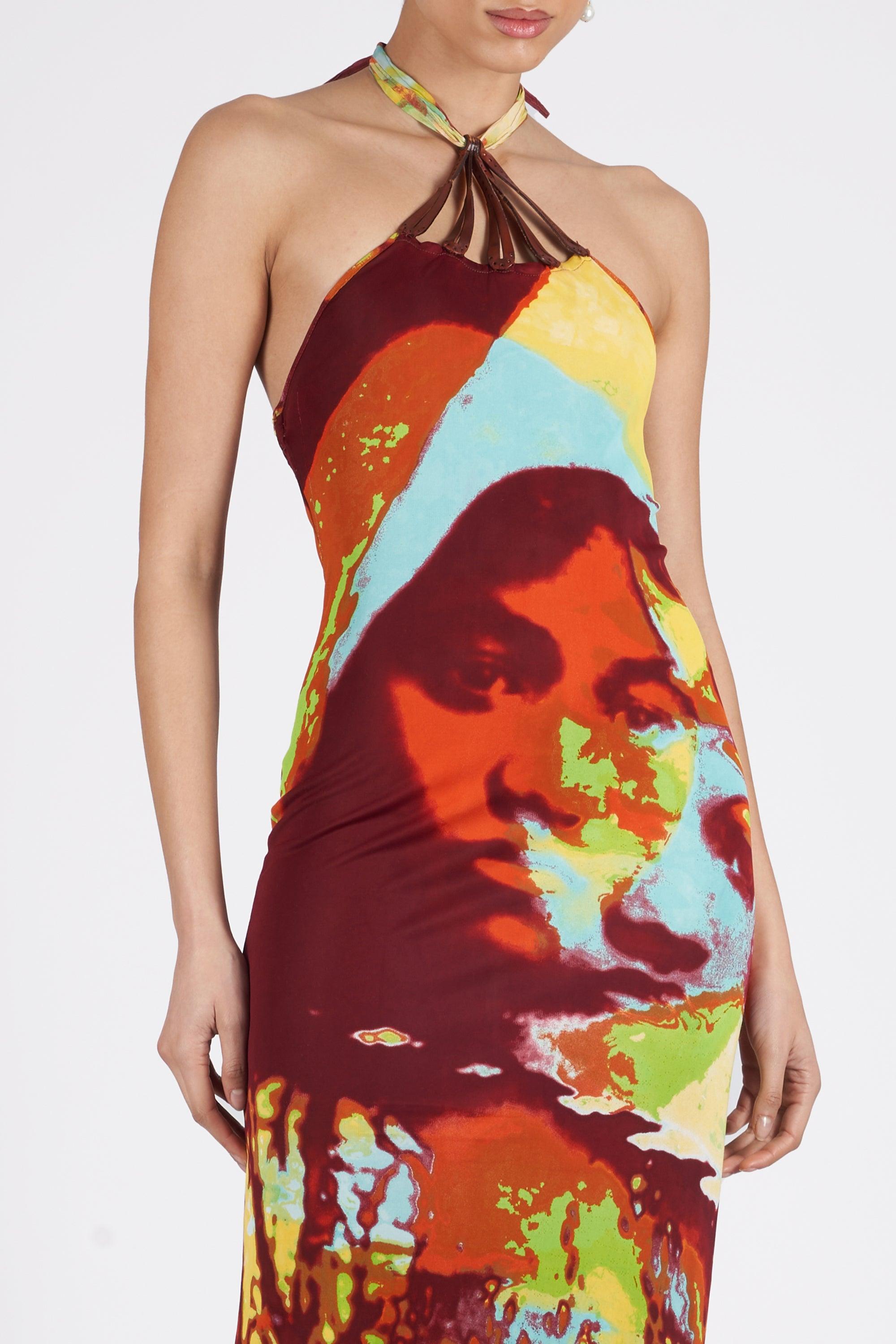 We are very excited to present this Jean Paul Gaultier Spring Summer 2000’s faces print halter neck dress. Features leather panels at the chest, open back, graphic print and halter neck closure. In great vintage condition. As seen on the