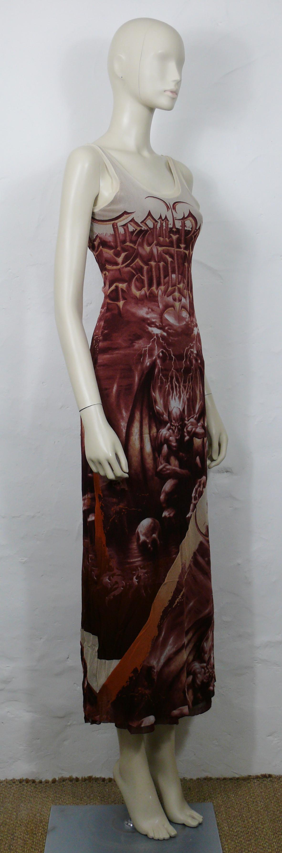JEAN PAUL GAULTIER vintage semi sheer mesh dress printed with demonic imagery and JEAN PAUL GAULTIER logos at the front and back.

Fully lined (sheer mesh).
Slips on.

Label reads JEAN PAUL GAULTIER Maille Femme.
Made in Italy.

Size label reads :