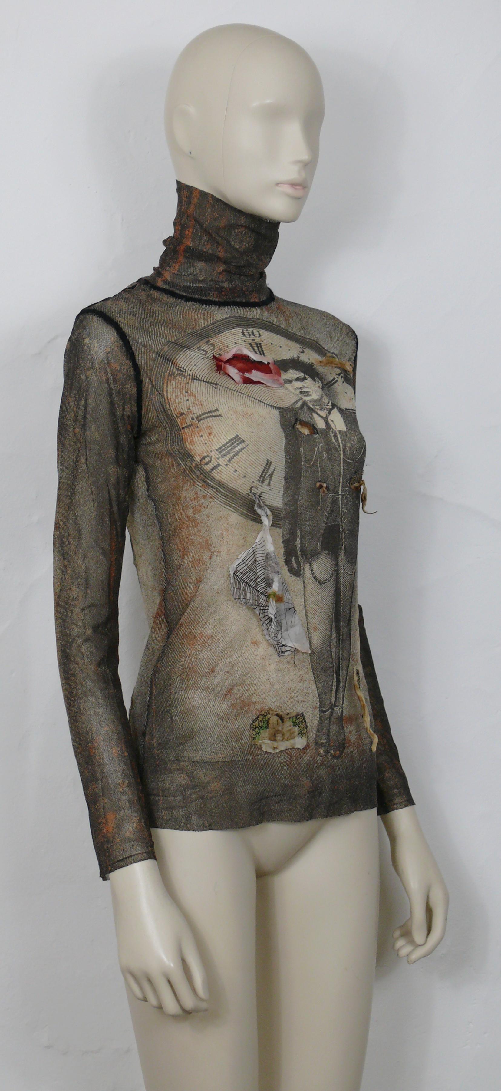 JEAN PAUL GAULTIER vintage sheer FUZZI mesh turtleneck top featuring a punk lady and clock print with eye, doll heads and cobwebs appliques.

Label reads JEAN PAUL GAULTIER MAILLE FEMME.
Made in Italy.

Size label reads : L.
Please refer to