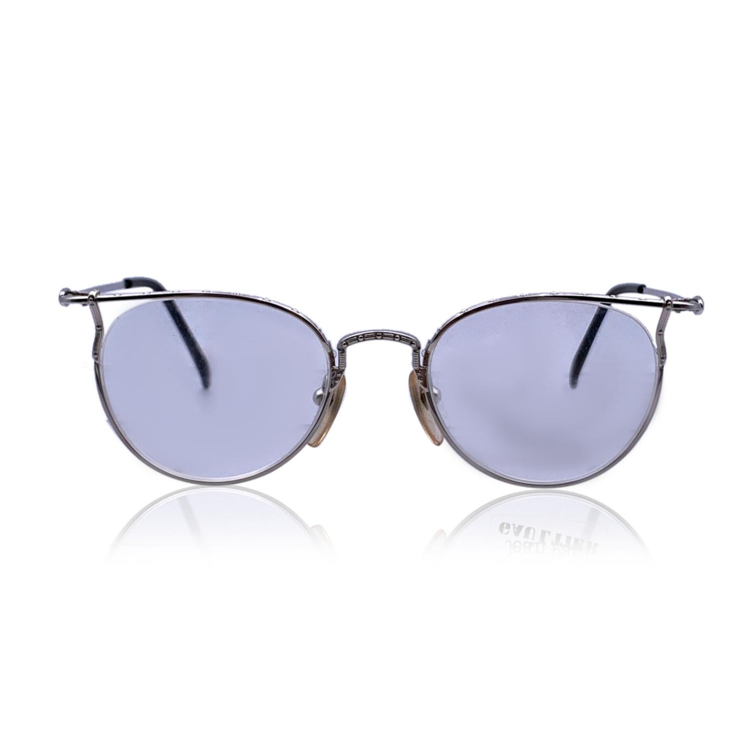 Silver metal eyeglasses by Jean Paul Gaultier . Rounded design. Model: 55-3177 - 47/20- 140 mm. Clear demo lens. Made in Japan

Details

MATERIAL: Metal

COLOR: Silver

MODEL: 55-3177

GENDER: Unisex Adults

COUNTRY OF MANUFACTURE: Japan

ORIGINAL
