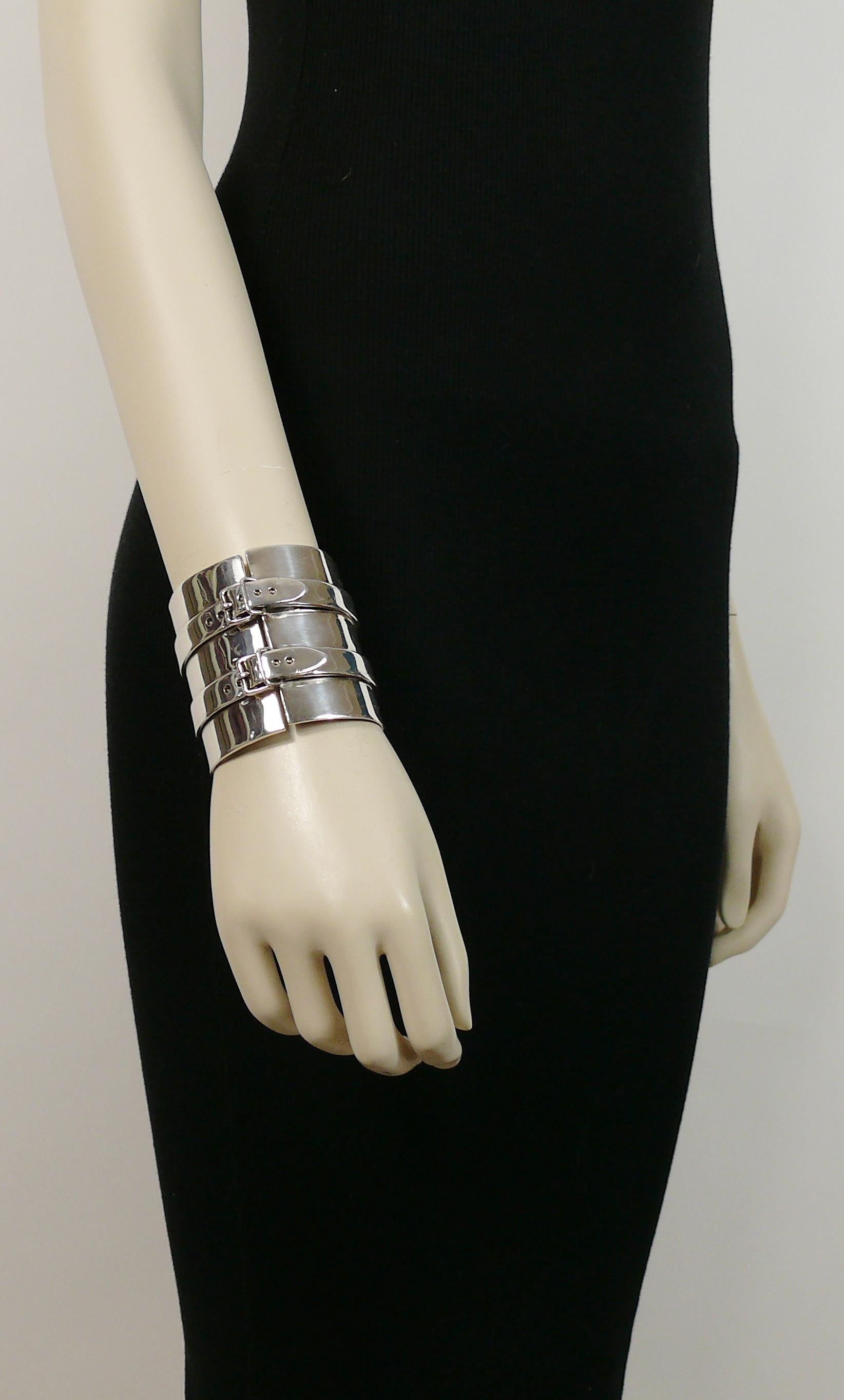 JEAN PAUL GAULTIER rare polished silver toned wide cuff bracelet featuring amazing buckle details.

Embossed JEAN PAUL GAULTIER.

Indicative measurements : inner circumference approx. 17.91 cm (7.05 inches) / width approx. 6.3 cm (2.48