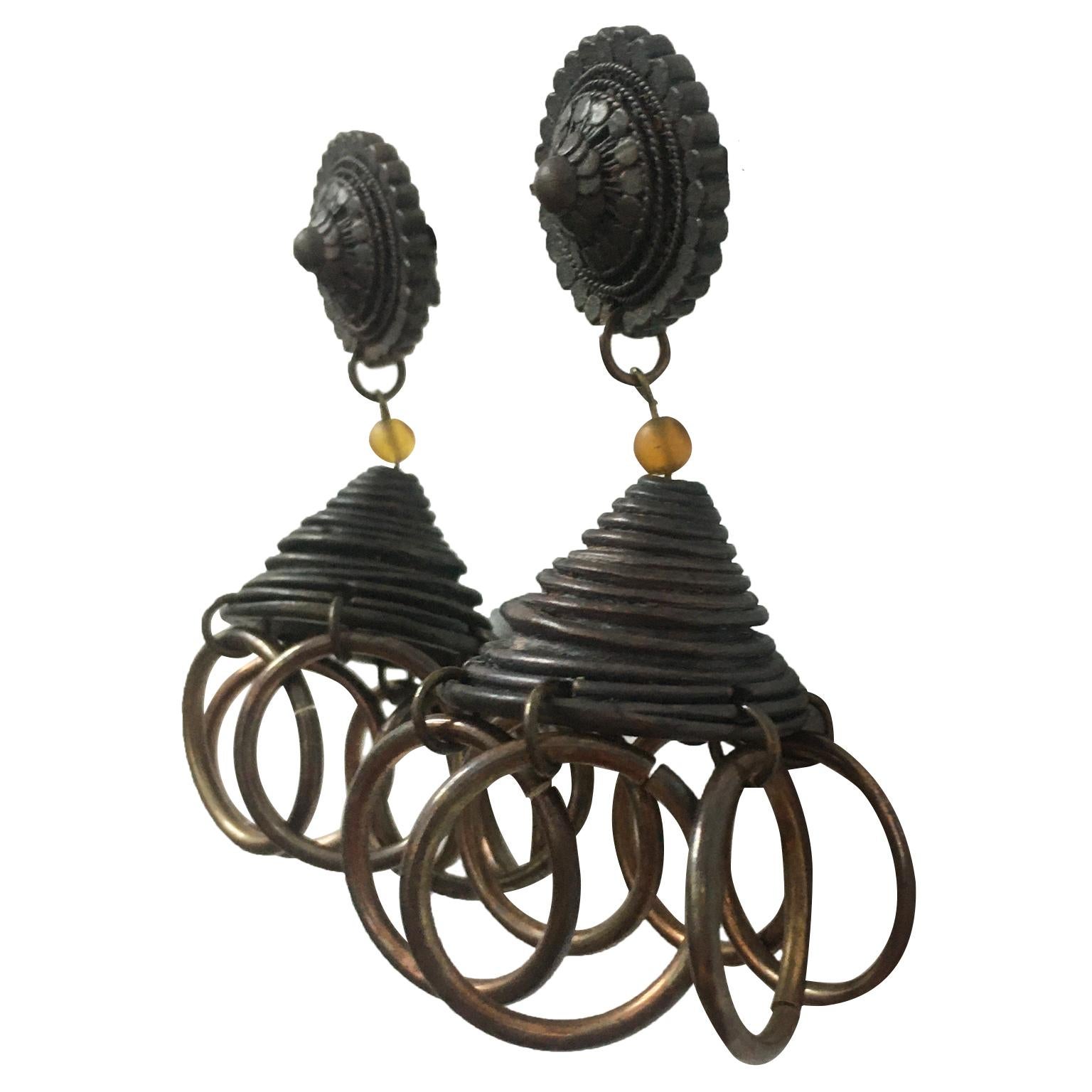 Jean Paul Gaultier vintage rare XL earrings (clip-on) featuring spiral details and rings in a bronze / copper toned setting. JPG inlaid initials on back part. With Original box.

Indicative measurements :
Width (at widest) - 1.5