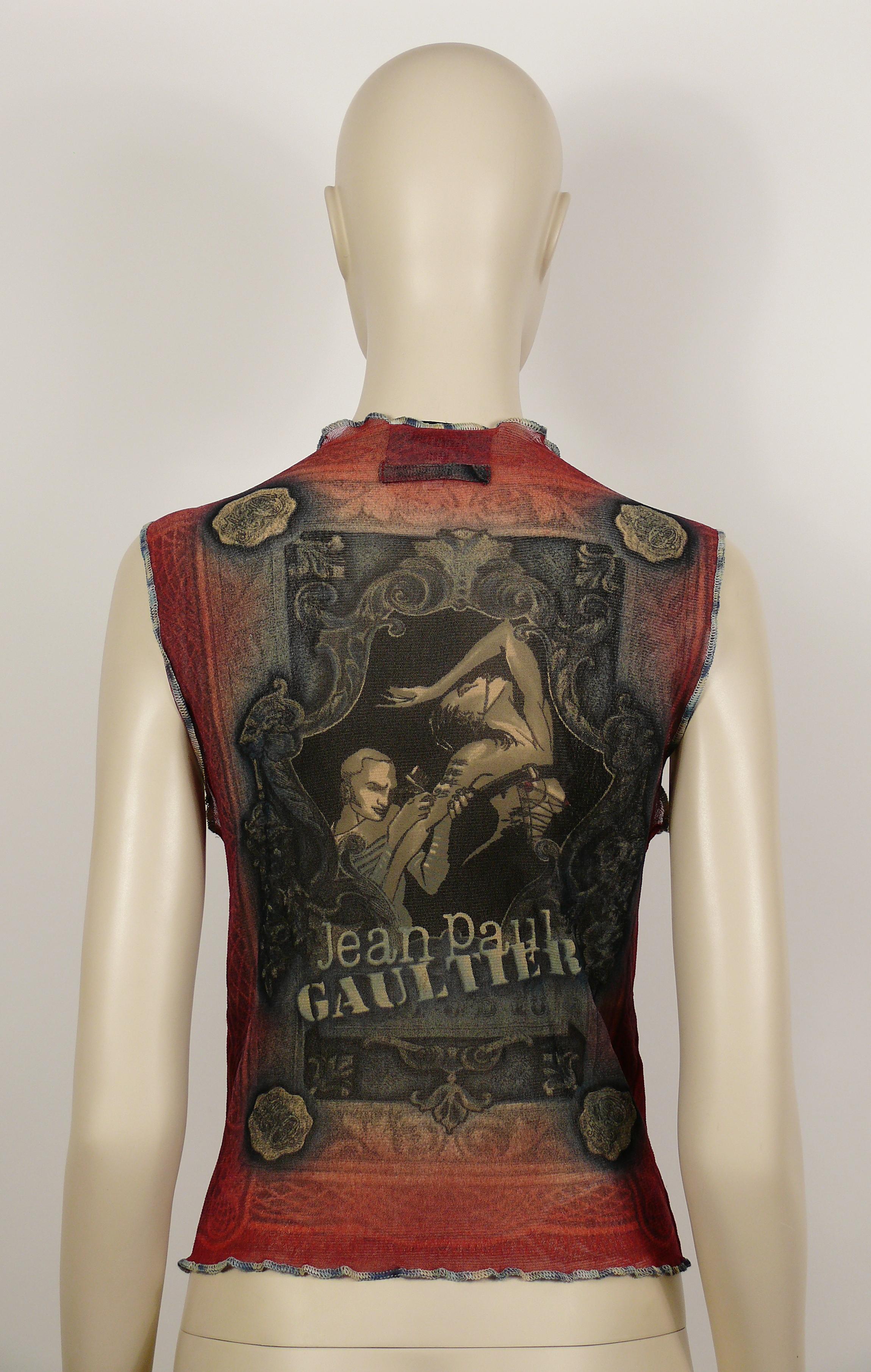 JEAN PAUL GAULTIER vintage sheer FUZZI mesh vest featuring a dramatic tattoo session and JEAN PAUL GAULTIER logo on front and back.

Button down front closure.
Two pockets.

Label reads JEAN PAUL GAULTIER Maille.
Made in Italy.

Size label reads :