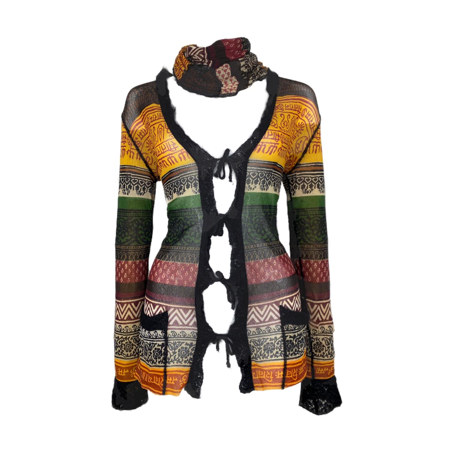 Jean Paul Gaultier Classique Vintage Tribal Print Mesh Top

1990s

Iconic Print 

Lightweight Stretchy Mesh Material 

Features scarf detail, and tie front Cardigan.

100% Authentic

CONDITION: This item is a vintage/pre-worn piece so some signs of
