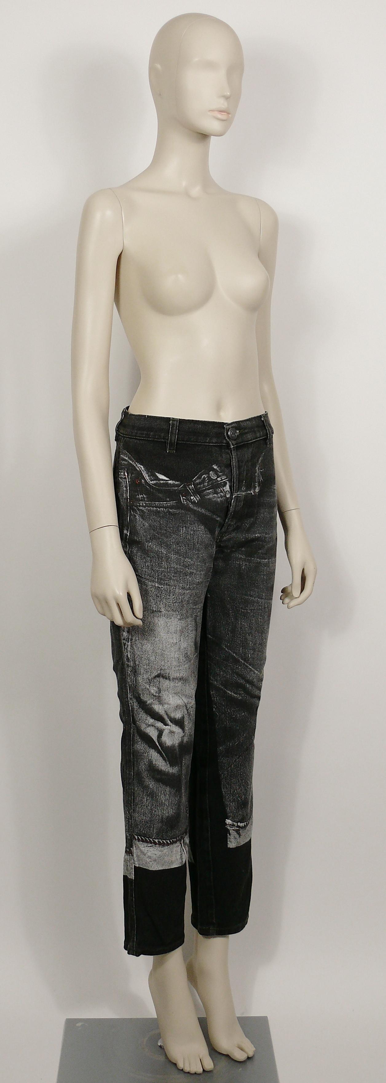 JEAN PAUL GAULTIER vintage denim pants trousers featuring an x-ray screen trompe l’œil jeans on front and back.

These trousers feature :
- Distressed black denim jeans featuring x-ray screen trompe l’œil jeans on front and back.
- Front down