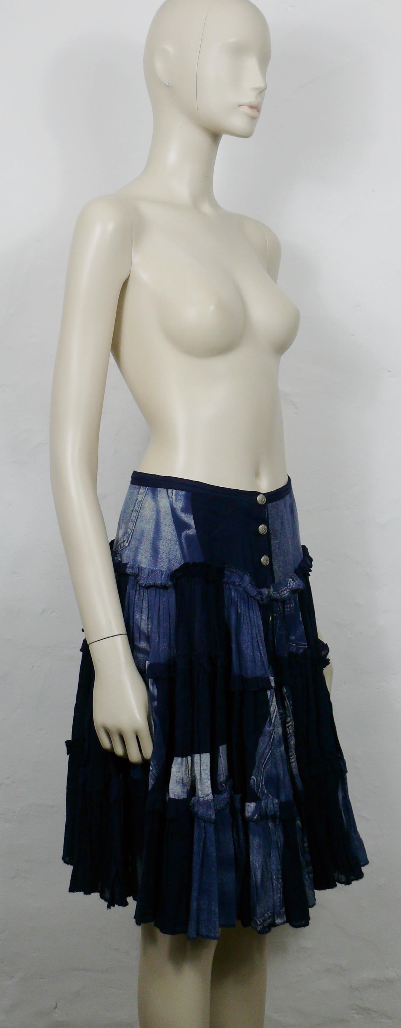 JEAN PAUL GAULTIER blue light cotton ruffle skirt featuring an X-RAY screen trompe l’œil jeans on front and back.

Knee length.
Front buttoning.
No lining.

Label reads GAULTIER JEAN'S Haute Jeanerie Tailored.
Made in Romania.

Size tag reads :