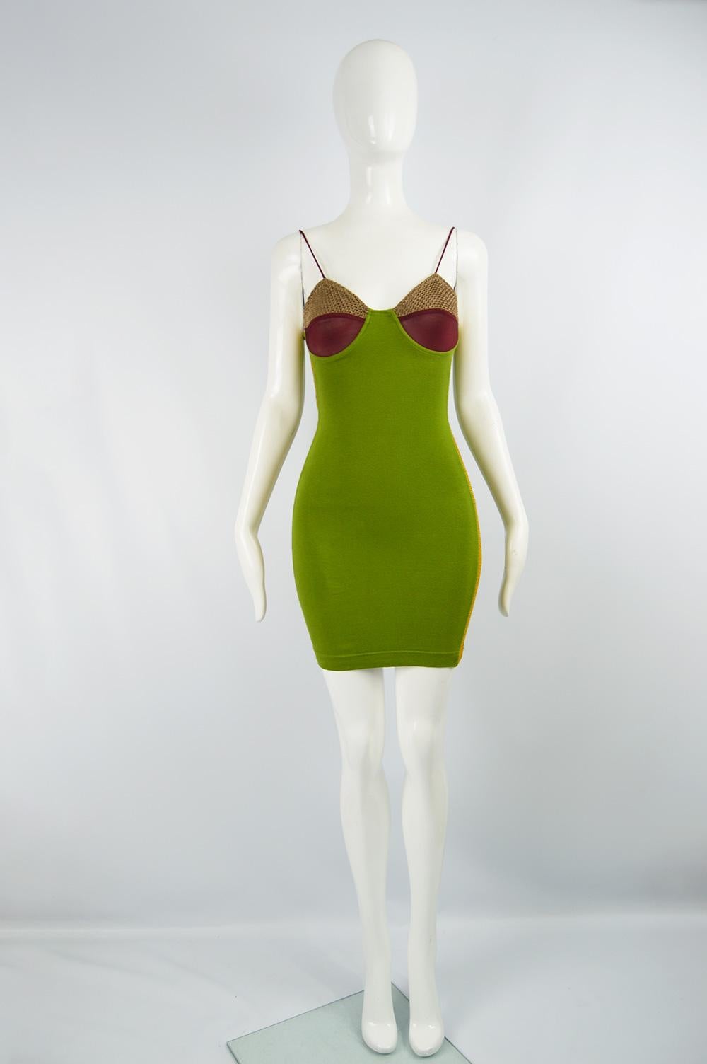 A sexy vintage party dress by Jean Paul Gaultier in a green stretch jersey with bra detail and knitted side panels. 

Size: Marked vintage IT 42 but fits more like a modern UK 8/ US 4/ FR 36. Please check measurements. 
Bust - Up to 32” / 81cm
Waist