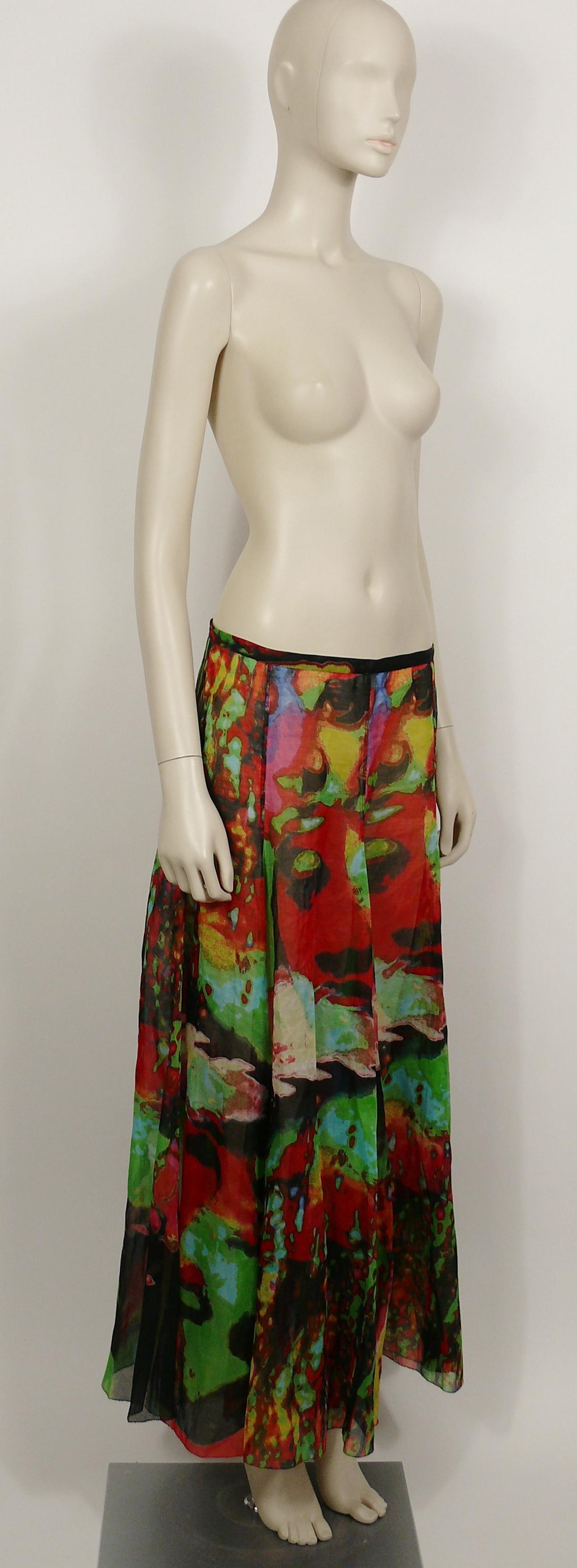 JEAN PAUL GAULTIER vintage sheer maxi skirt from the Spring/Summer Ready-to Wear Collection featuring faces in vibrant colors.

This dress is made of a kind of sheer semi rigid cotton veil.
Side buttoning.

Label reads JEAN PAUL GAULTIER Femme.
Made