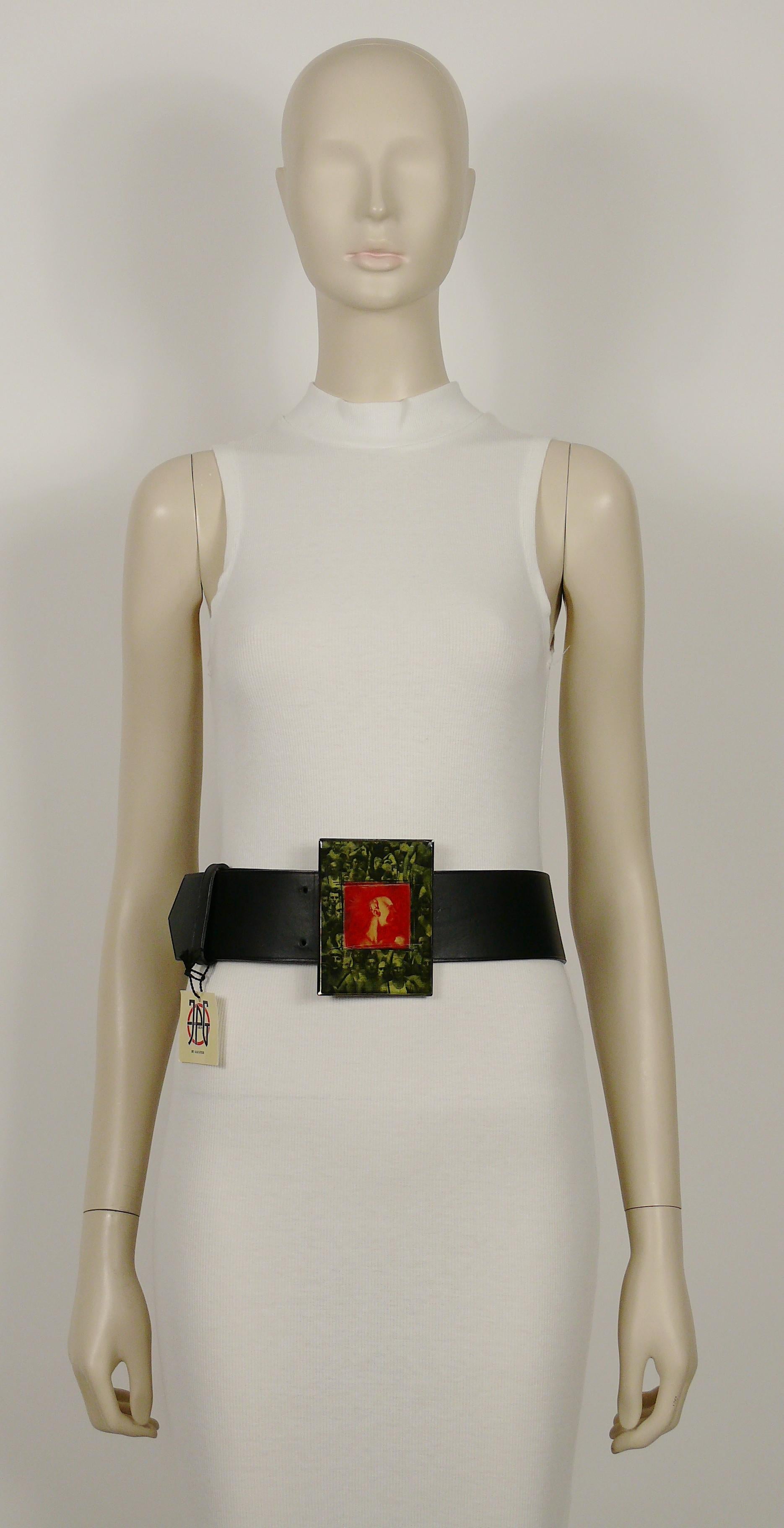 JEAN PAUL GAULTIER vintage wide black leather belt featuring a massive frame buckle printed with a punk and gay scene.

Embossed JEAN PAUL GAULTIER Made in Italy.

Indicated size : 80.

Indicative measurements : adjustable length from approx. 76.5